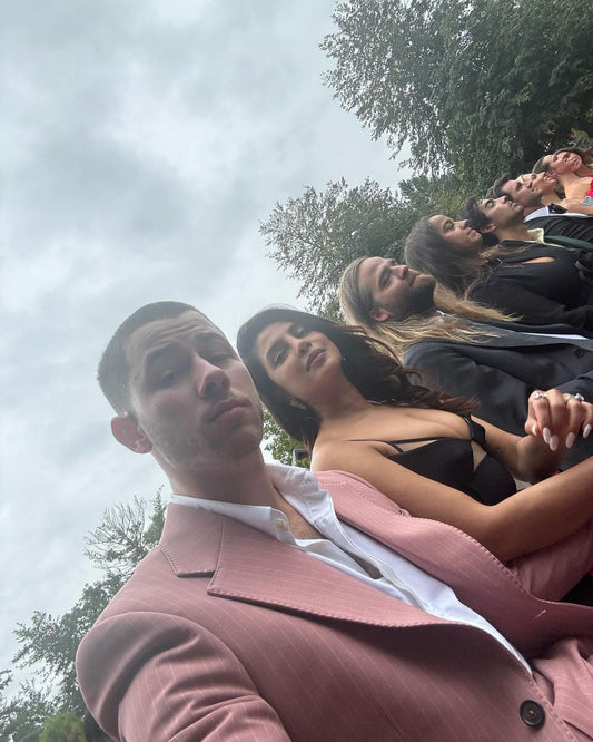 Priyanka Chopra Stuns in Black Dress, Nick Jonas Impresses in Pink Suit at Family Wedding