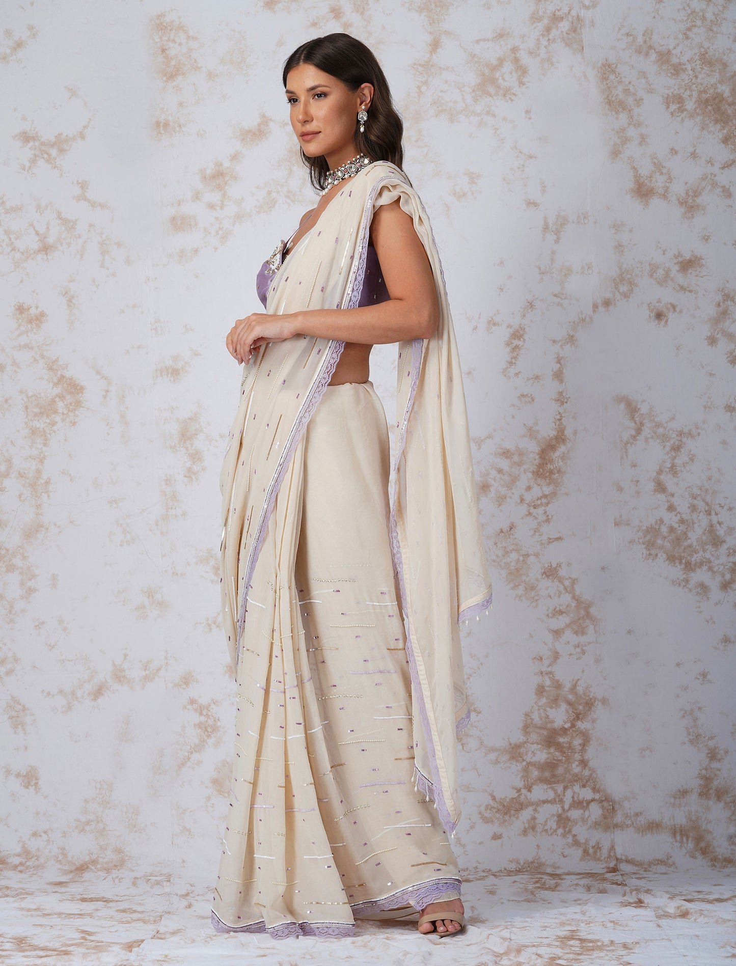 Deep Ivory Sequined Saree With Contrast Blouse