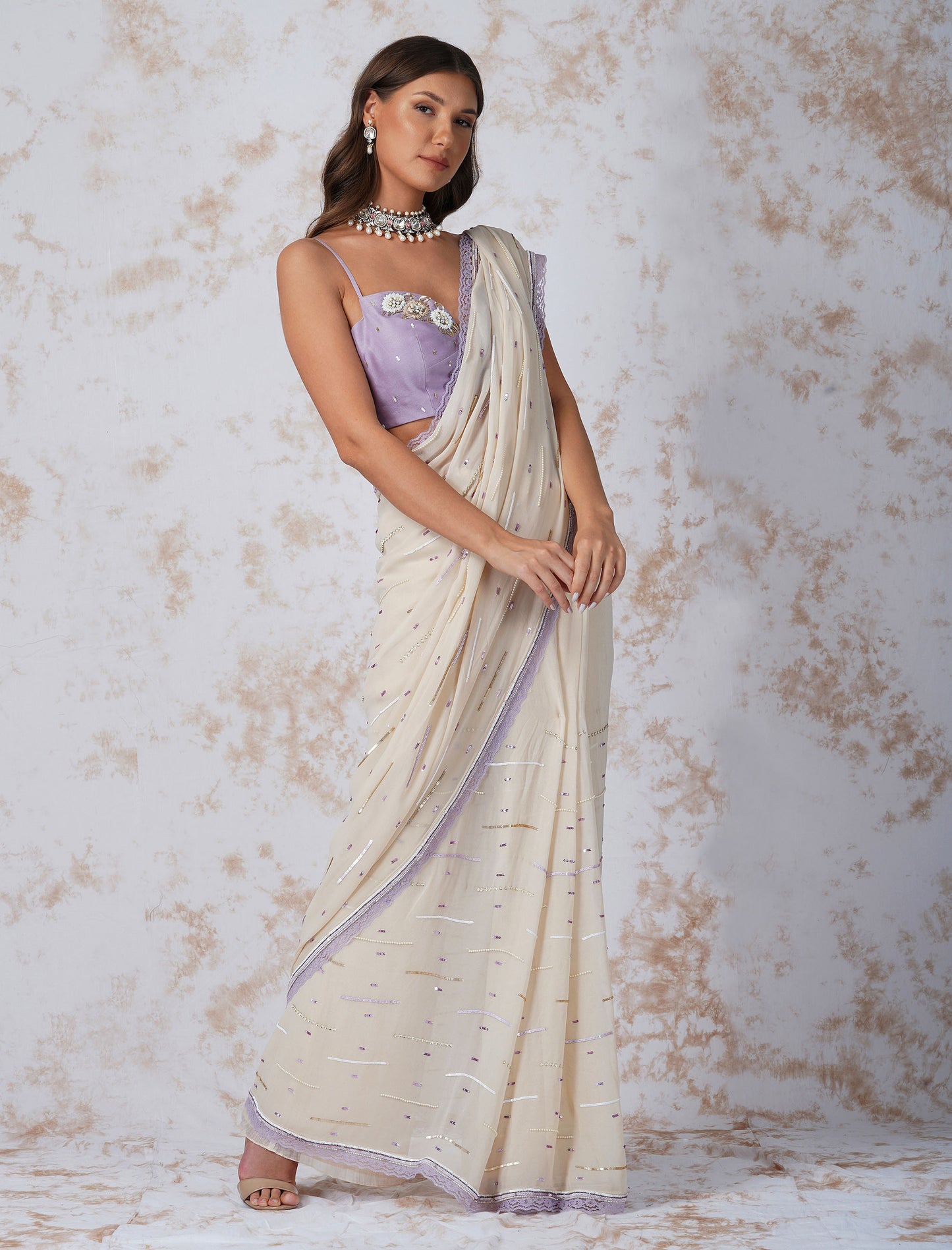 Deep Ivory Sequined Saree With Contrast Blouse