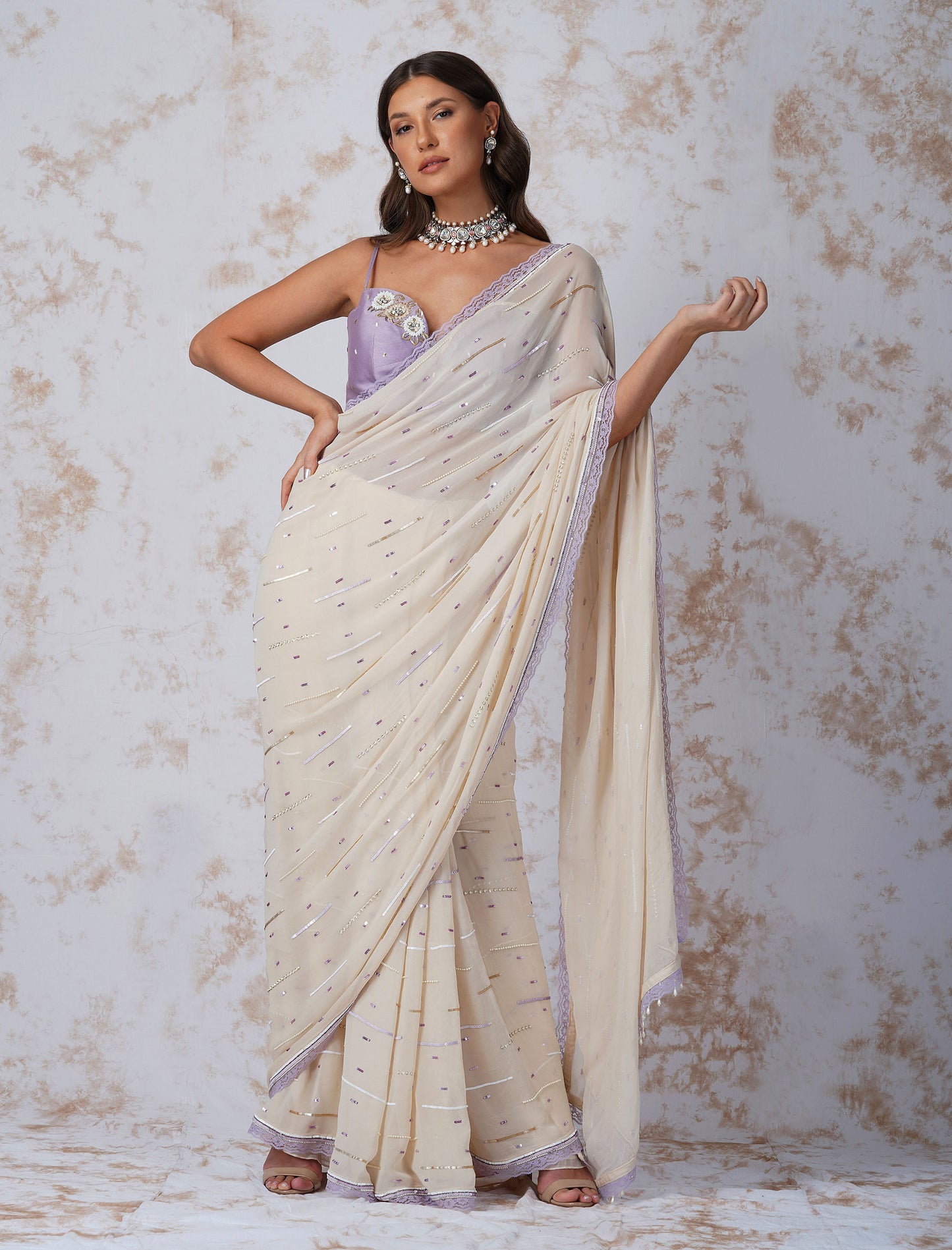 Deep Ivory Sequined Saree With Contrast Blouse