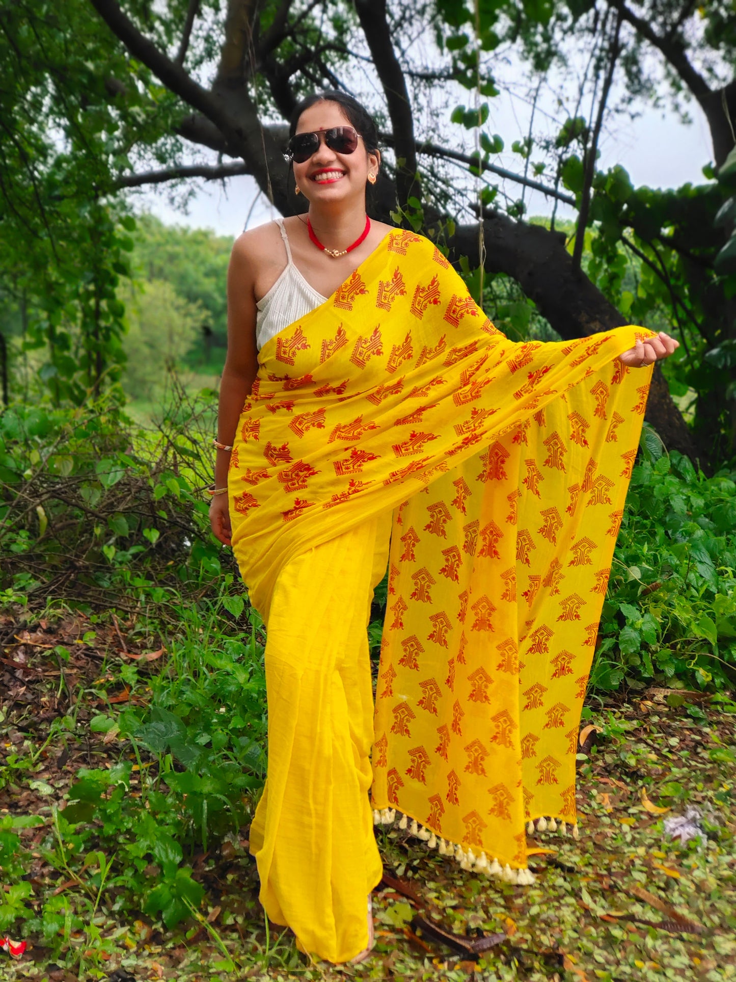 Yellow mul cotton saree with block printed ethnic motif