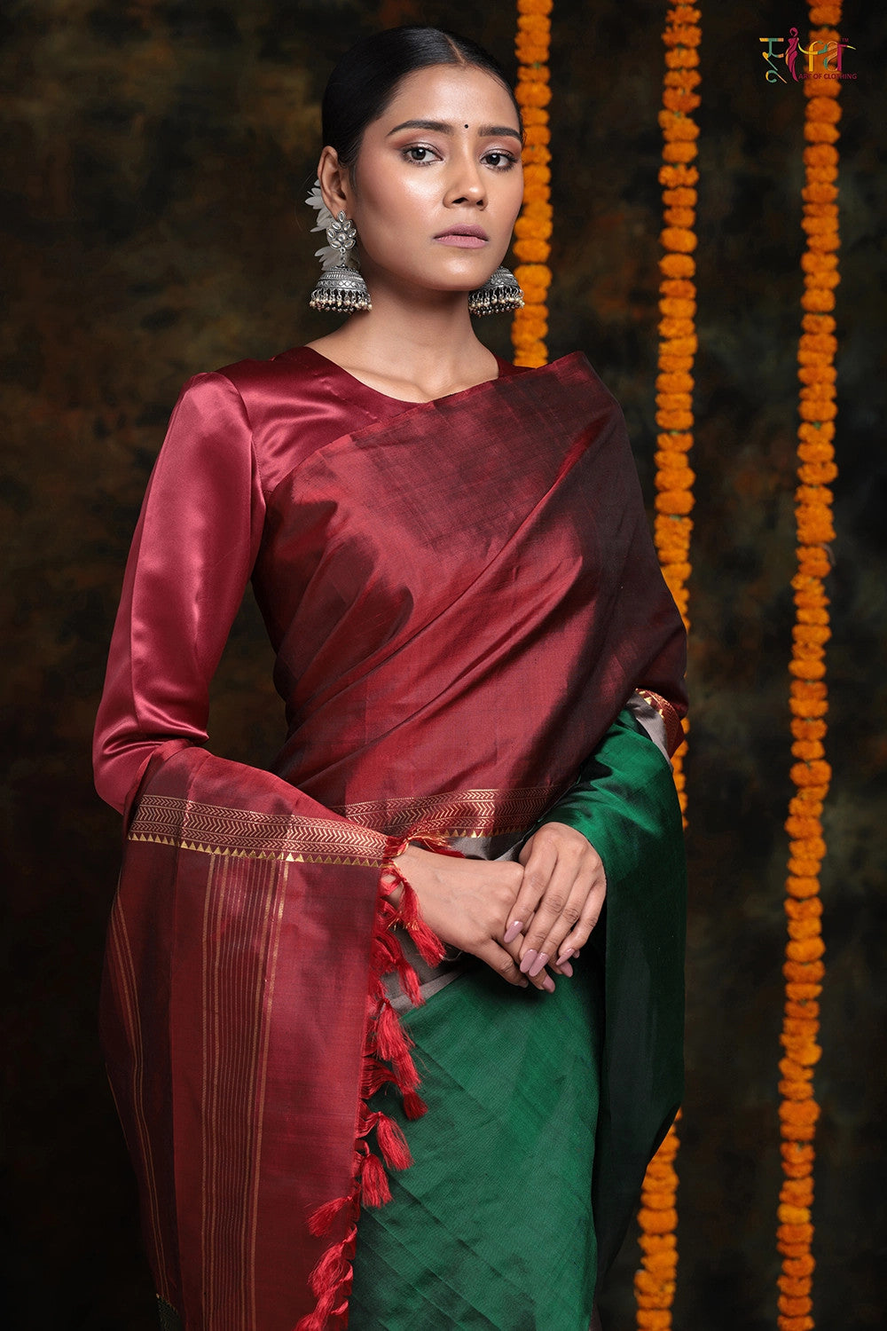 Handloom Maroon and Green Pure Silk contemporary Saree