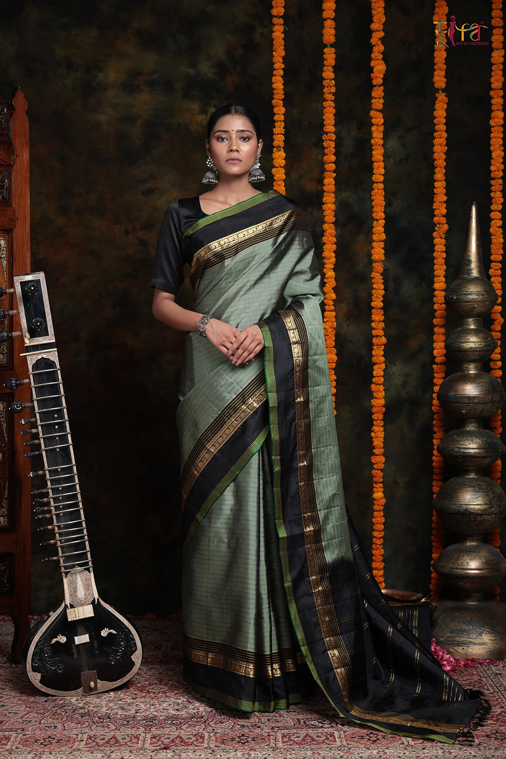 Handloom sage Green Pure Silk Saree with stripes