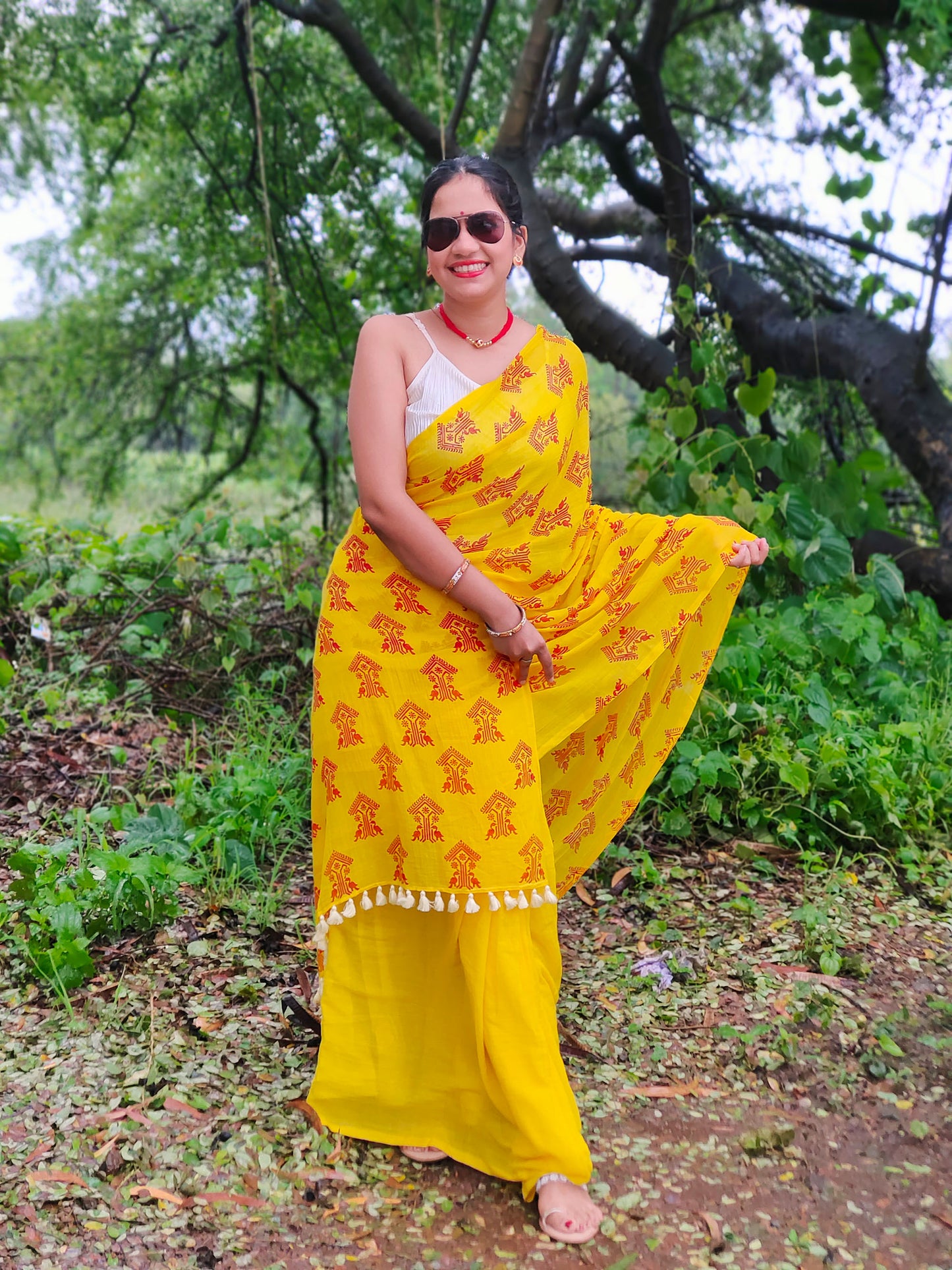 Yellow mul cotton saree with block printed ethnic motif