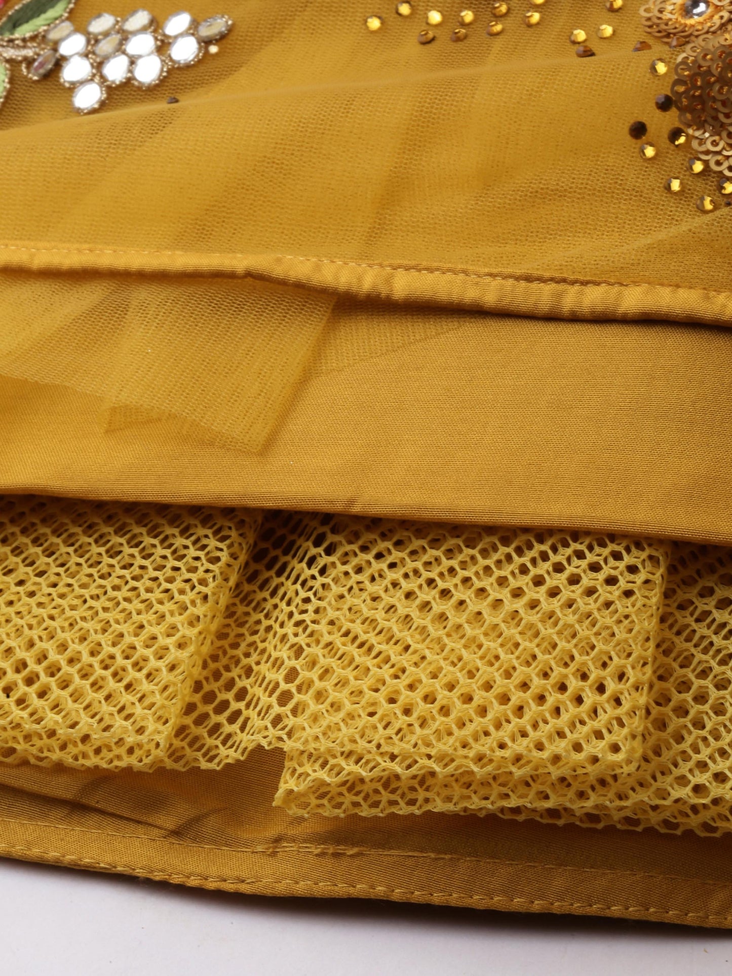 Mustard Net Semi stitched Coding, Sequins & Saroski Stone Work Lehenga Choli