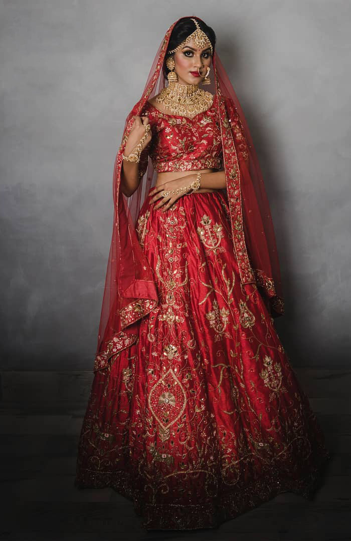 Red Raw Silk Leather and Aari work paradise lehenga