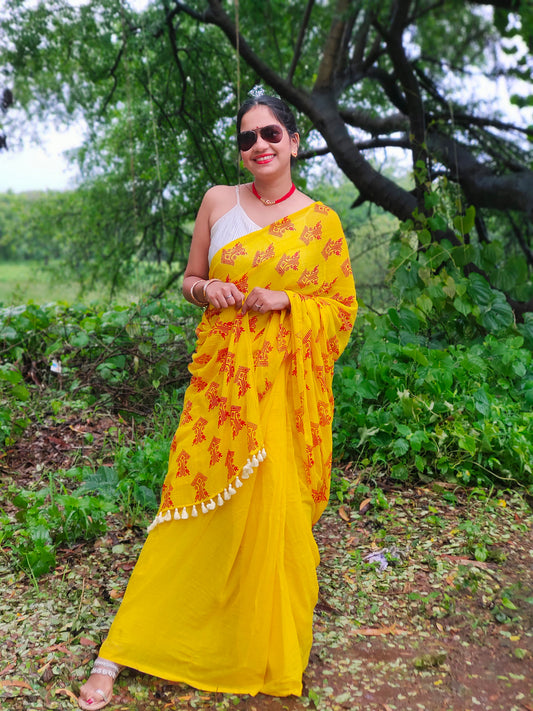 Yellow mul cotton saree with block printed ethnic motif