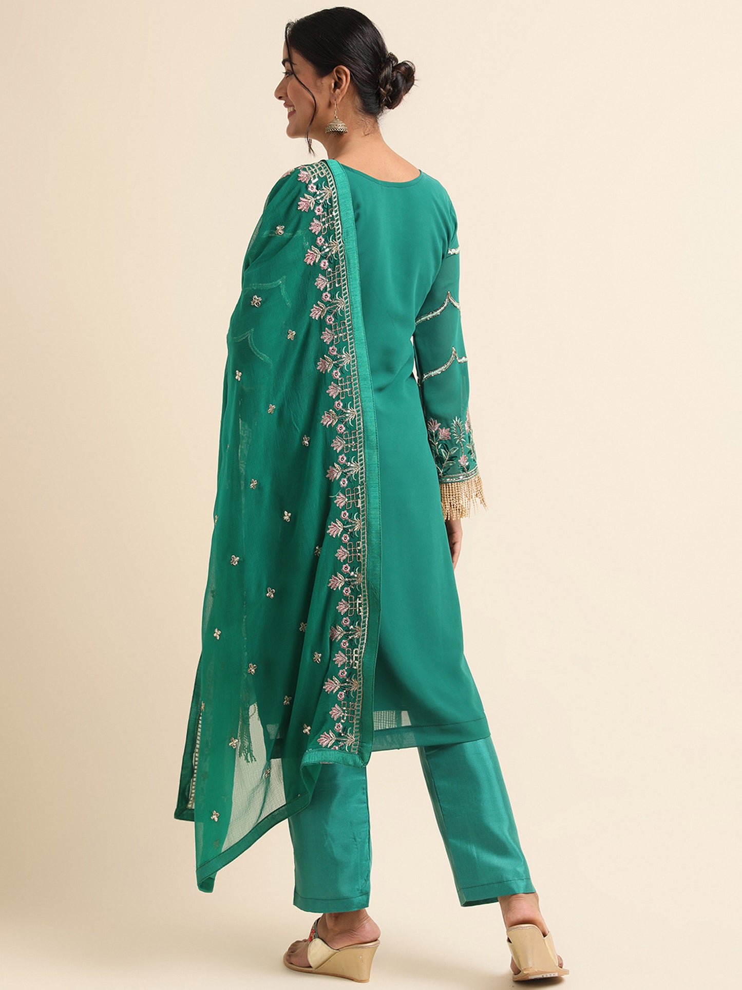 Green  sequins embroidered Faux Georgette Surya pakistani suit