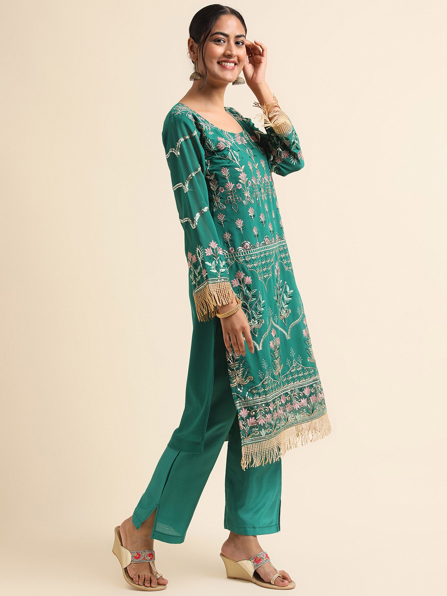 Green  sequins embroidered Faux Georgette Surya pakistani suit