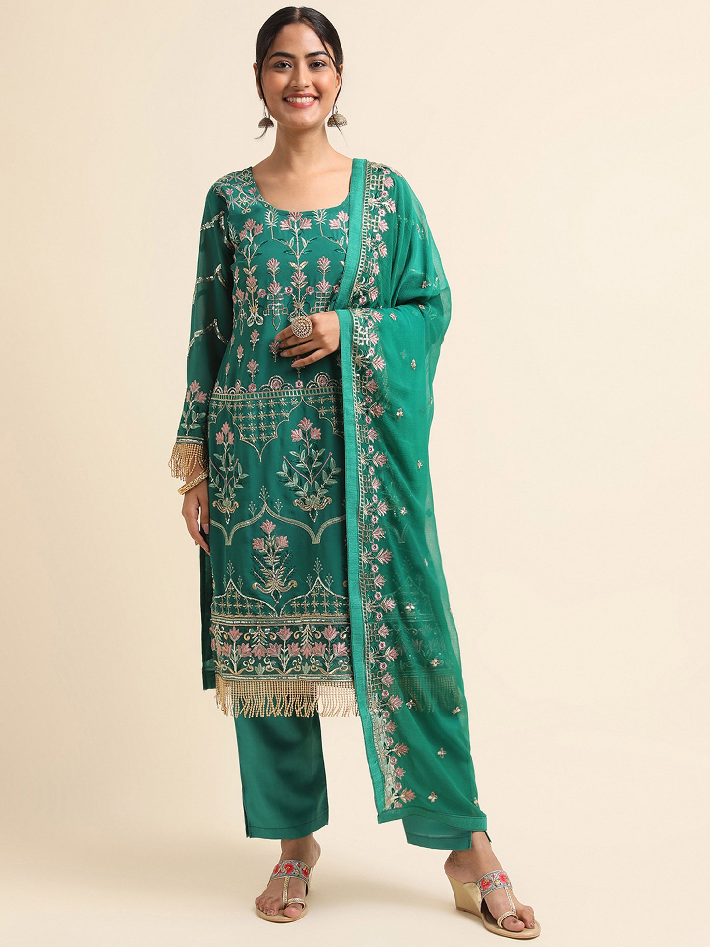 Green  sequins embroidered Faux Georgette Surya pakistani suit