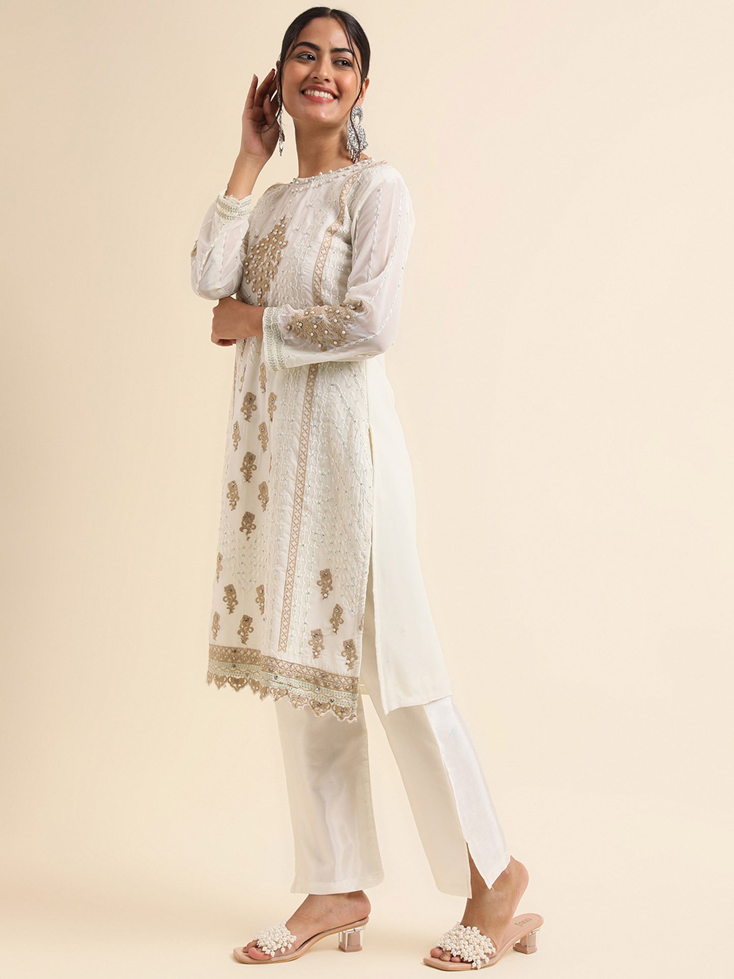 Off white sequins embroidered Faux Georgette Surya pakistani suit