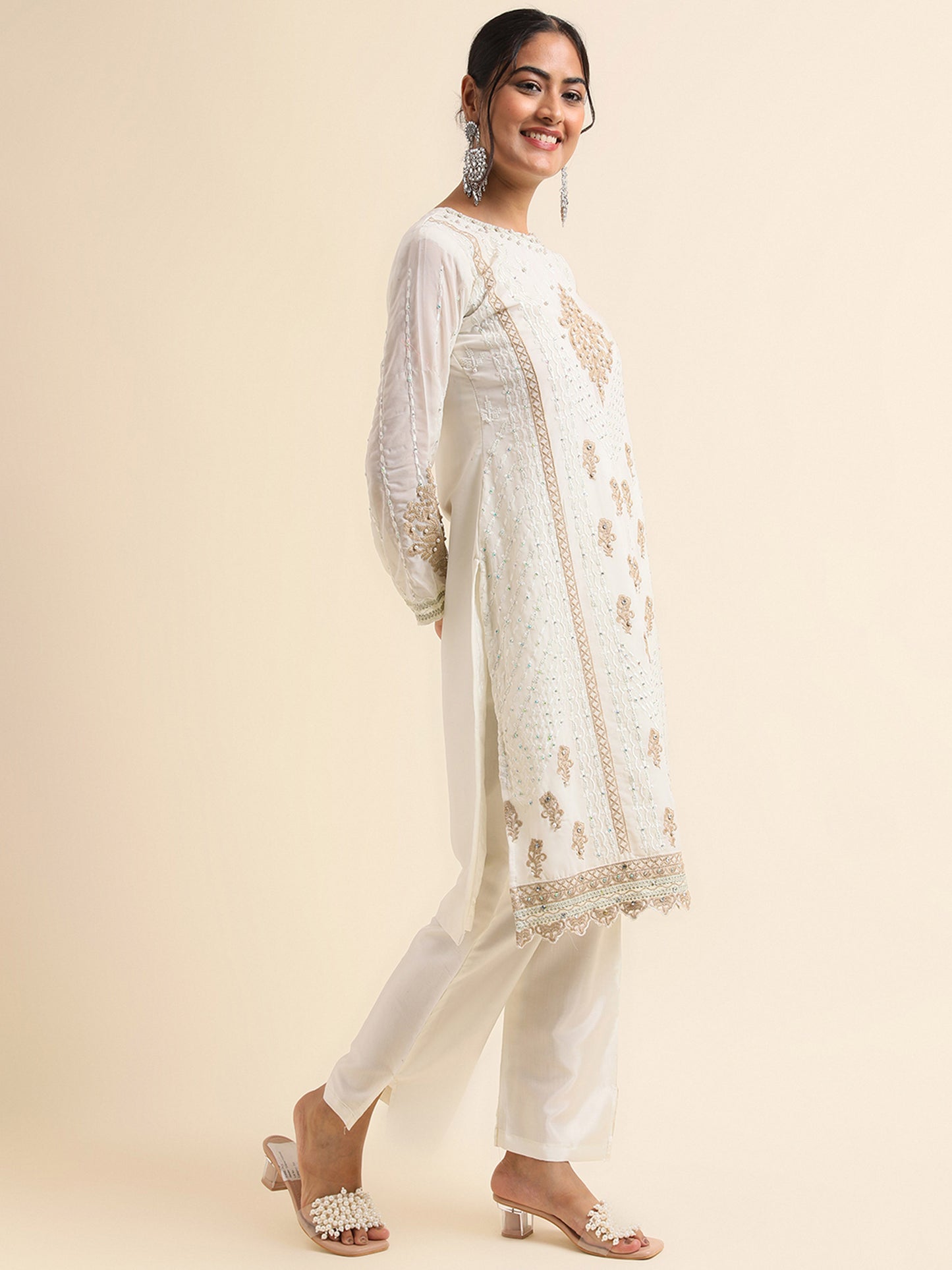 Off white sequins embroidered Faux Georgette Surya pakistani suit