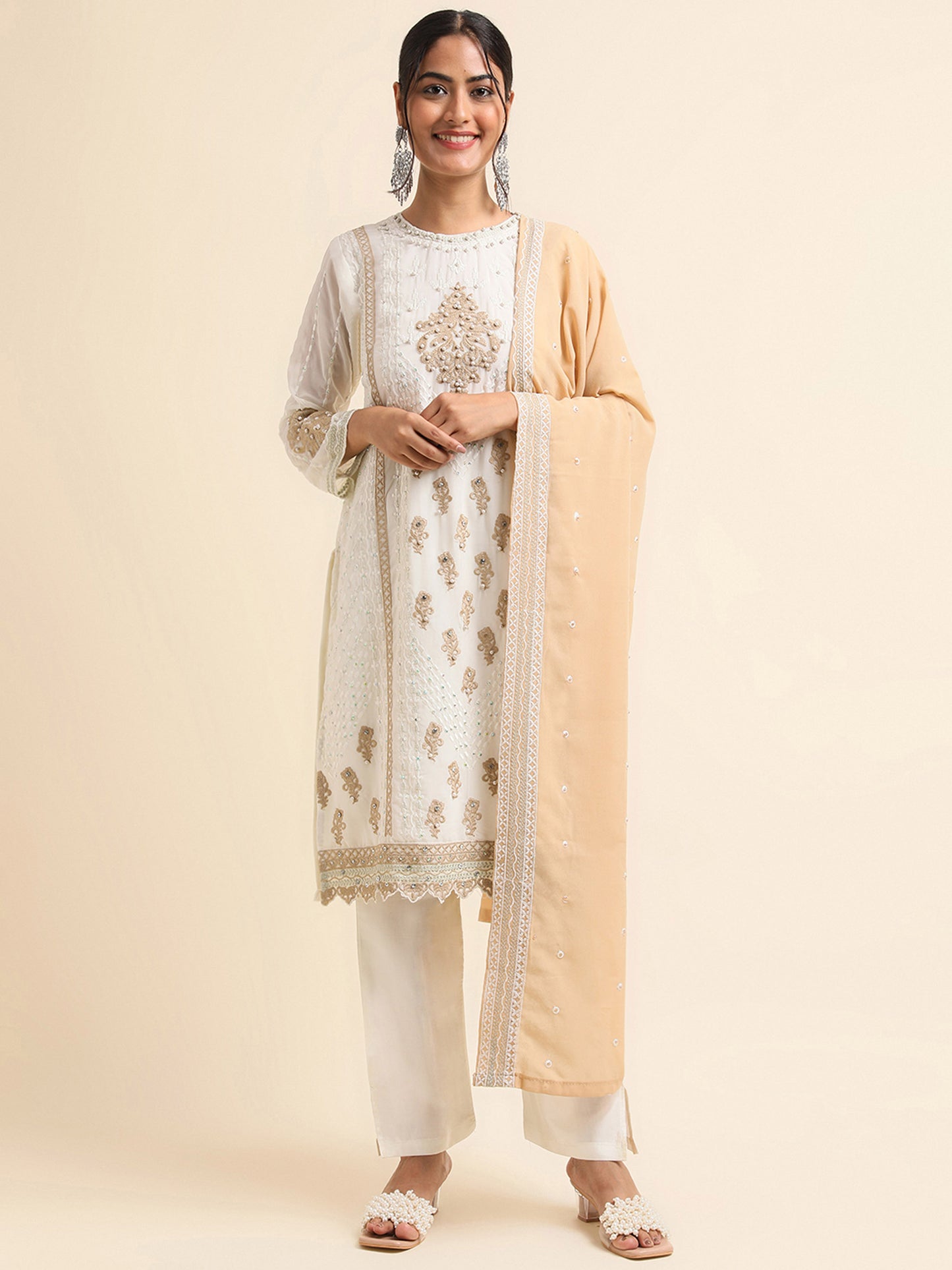 Off white sequins embroidered Faux Georgette Surya pakistani suit