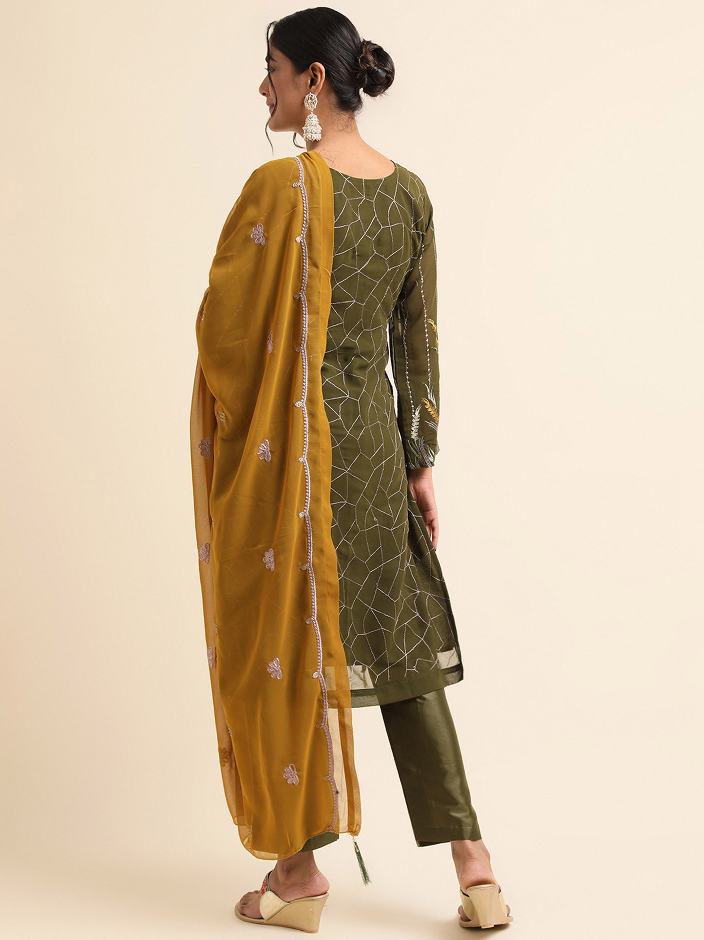 Green sequins embroidered Faux Georgette Surya pakistani suit