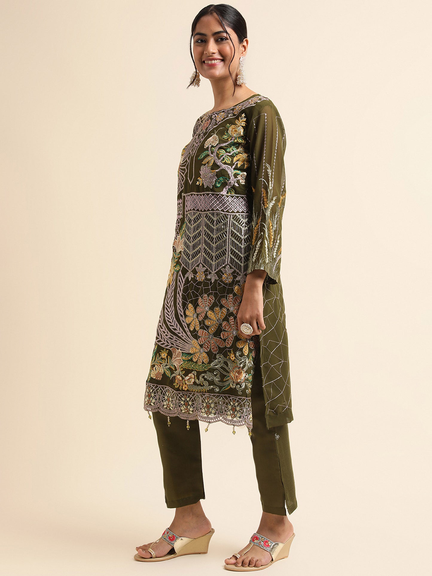 Green sequins embroidered Faux Georgette Surya pakistani suit