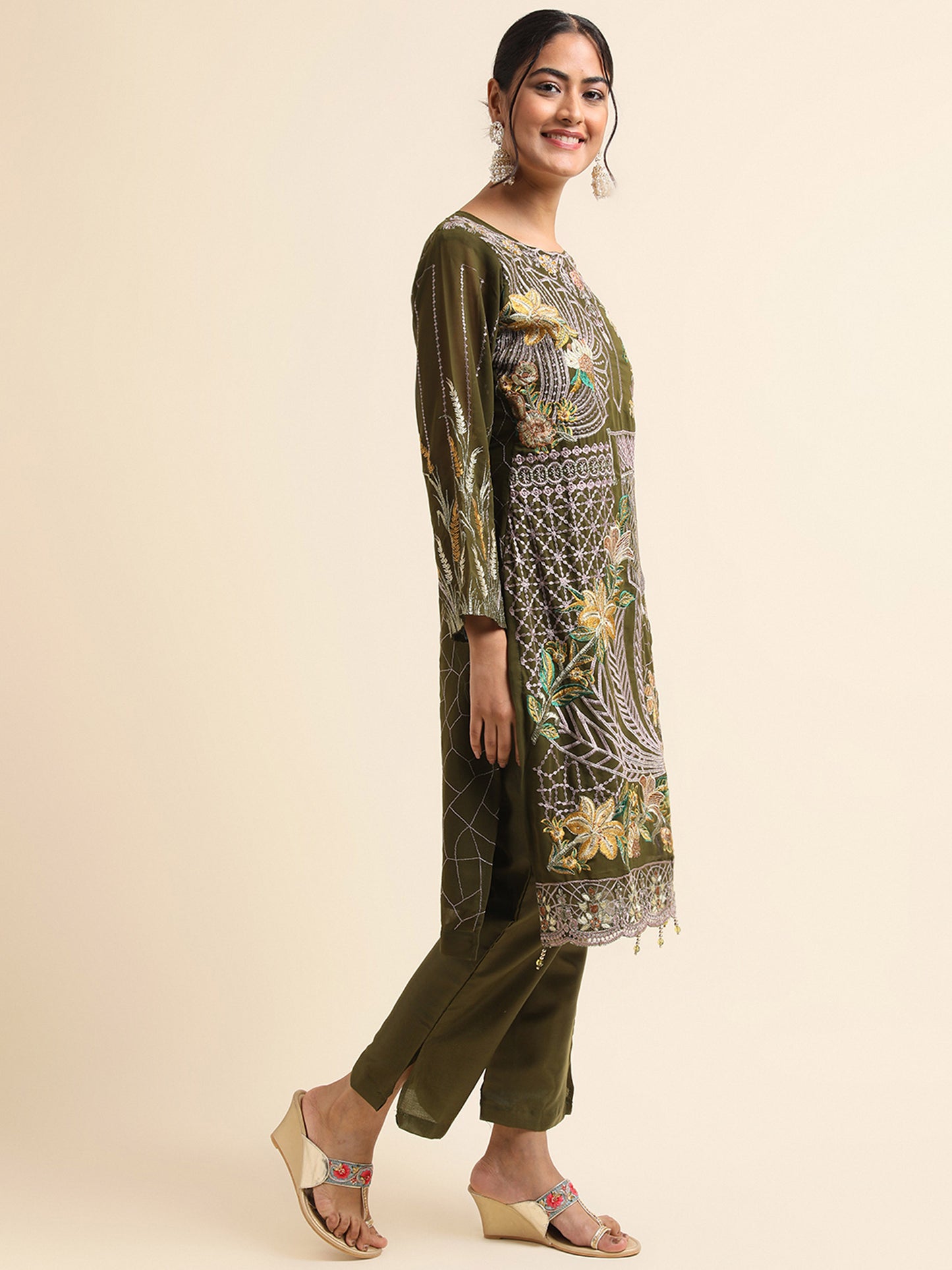 Green sequins embroidered Faux Georgette Surya pakistani suit