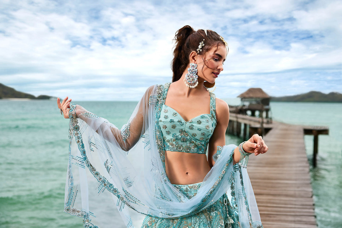 Turquoise Blue Net Sequins and Zarkan embroidery Lehenga