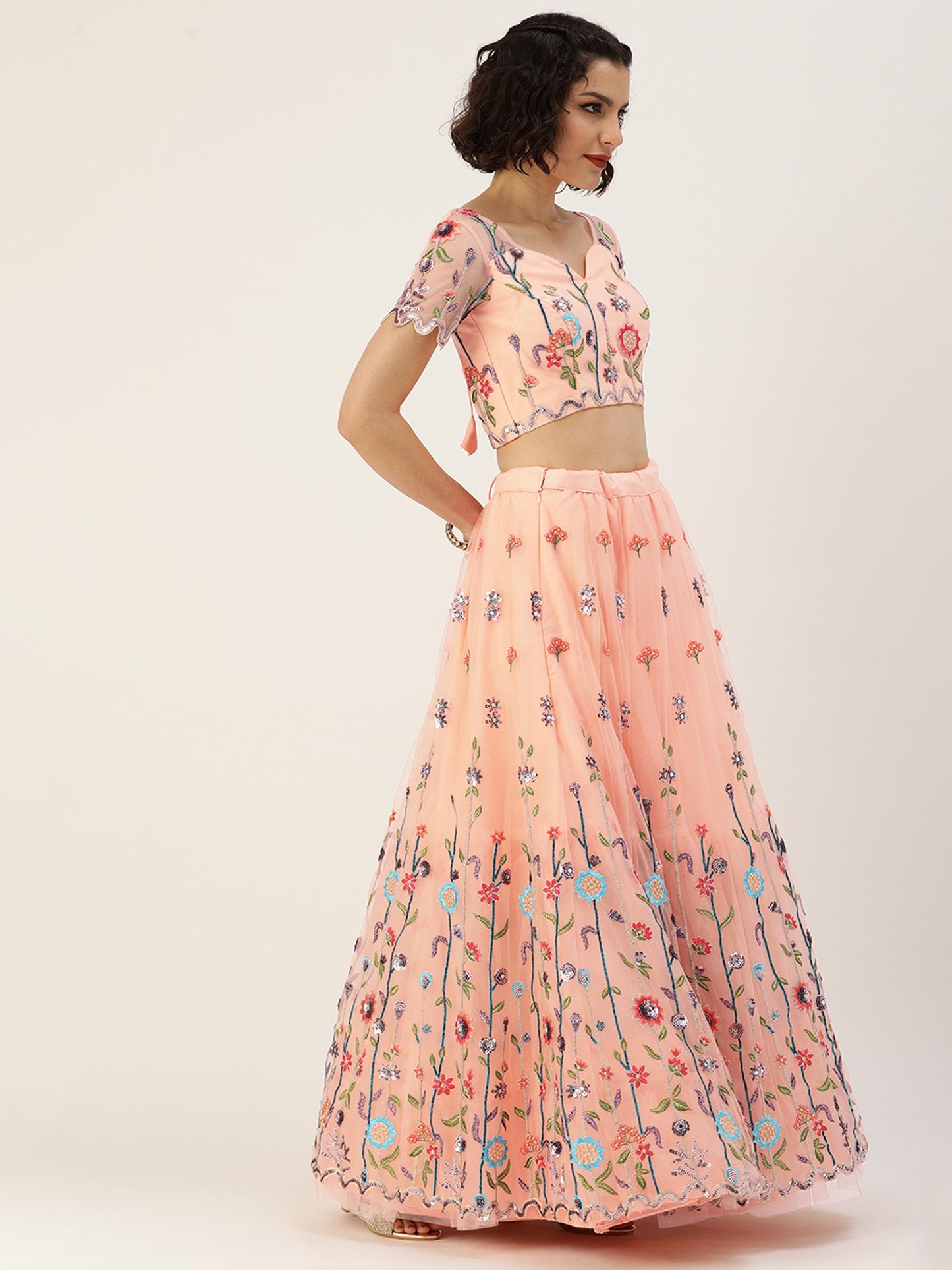 Women Peach Net Sequinse Embroidered Semi-Stitched Lehenga & Blouse with Dupatta