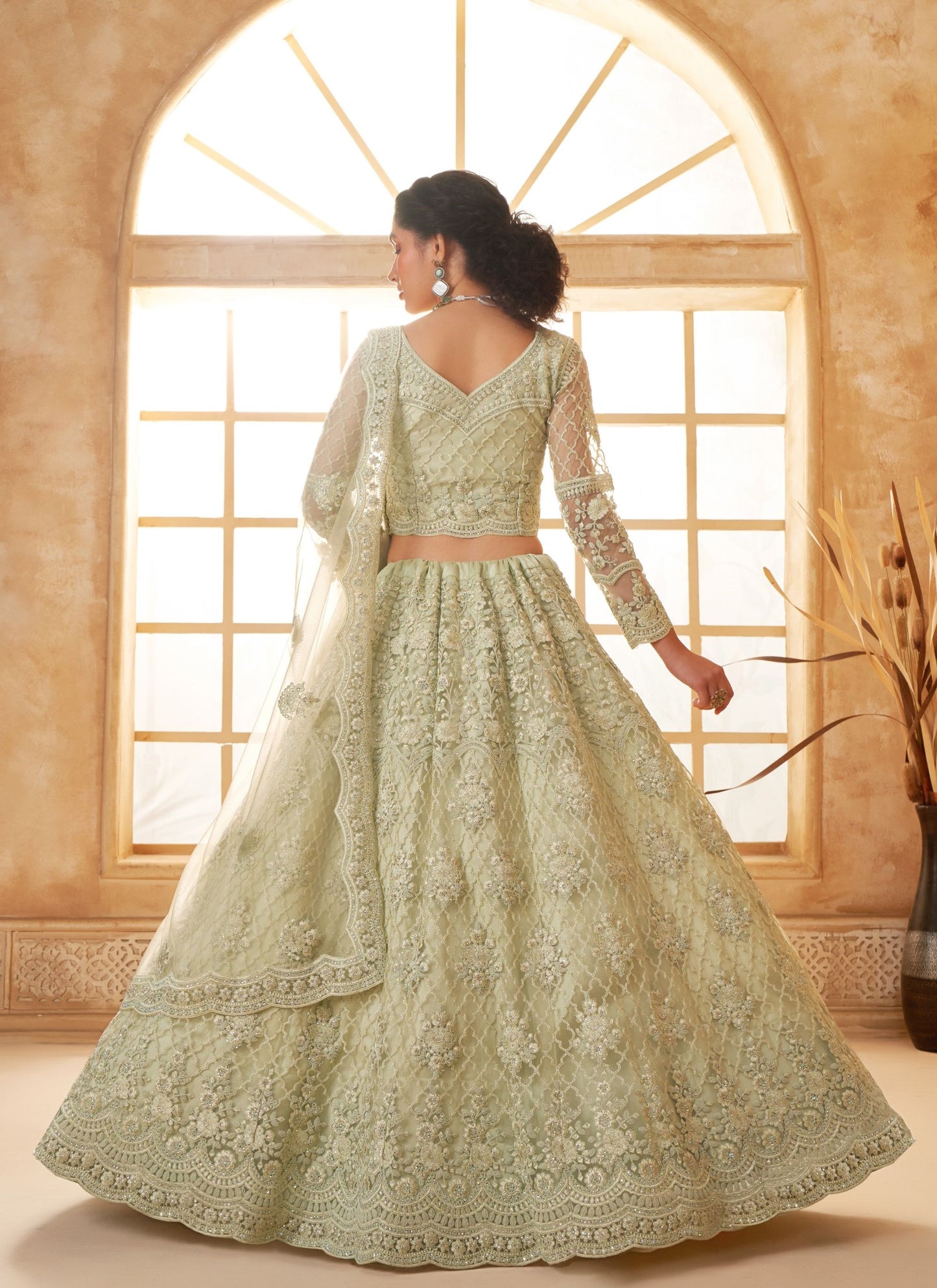 Pista Green Heavy Cording Embroidered Net Reception Lehenga Choli