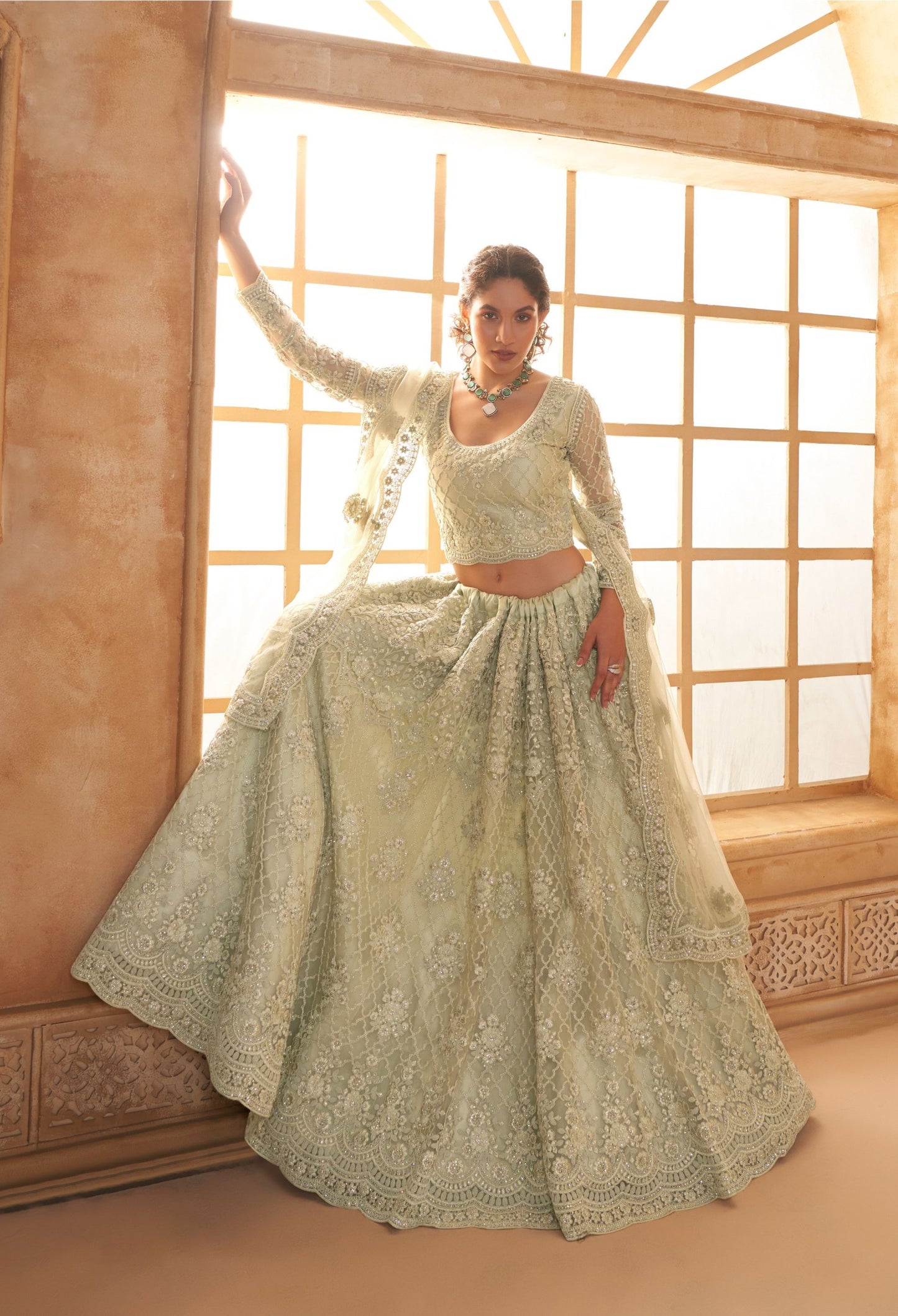 Pista Green Heavy Cording Embroidered Net Reception Lehenga Choli