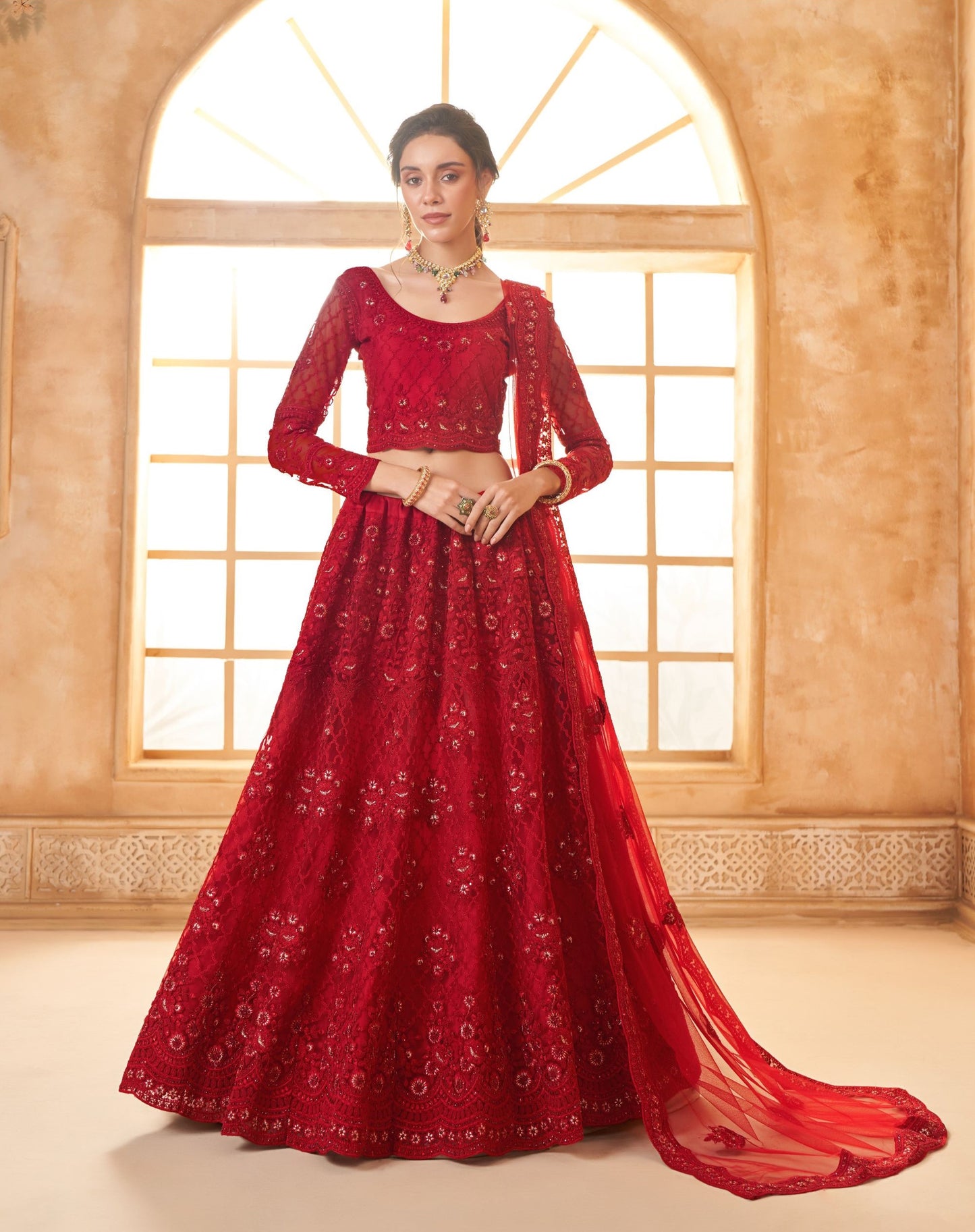 Red Heavy Thread Embroidered Net Bridal Lehenga Choli