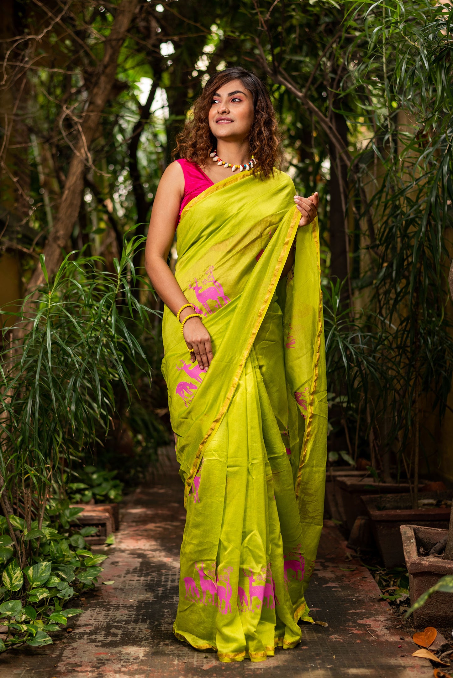 Green chanderi silk saree with ethnic deer motif