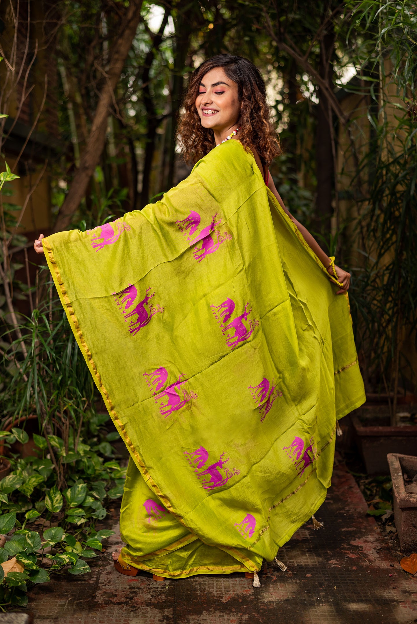 Green chanderi silk saree with ethnic deer motif