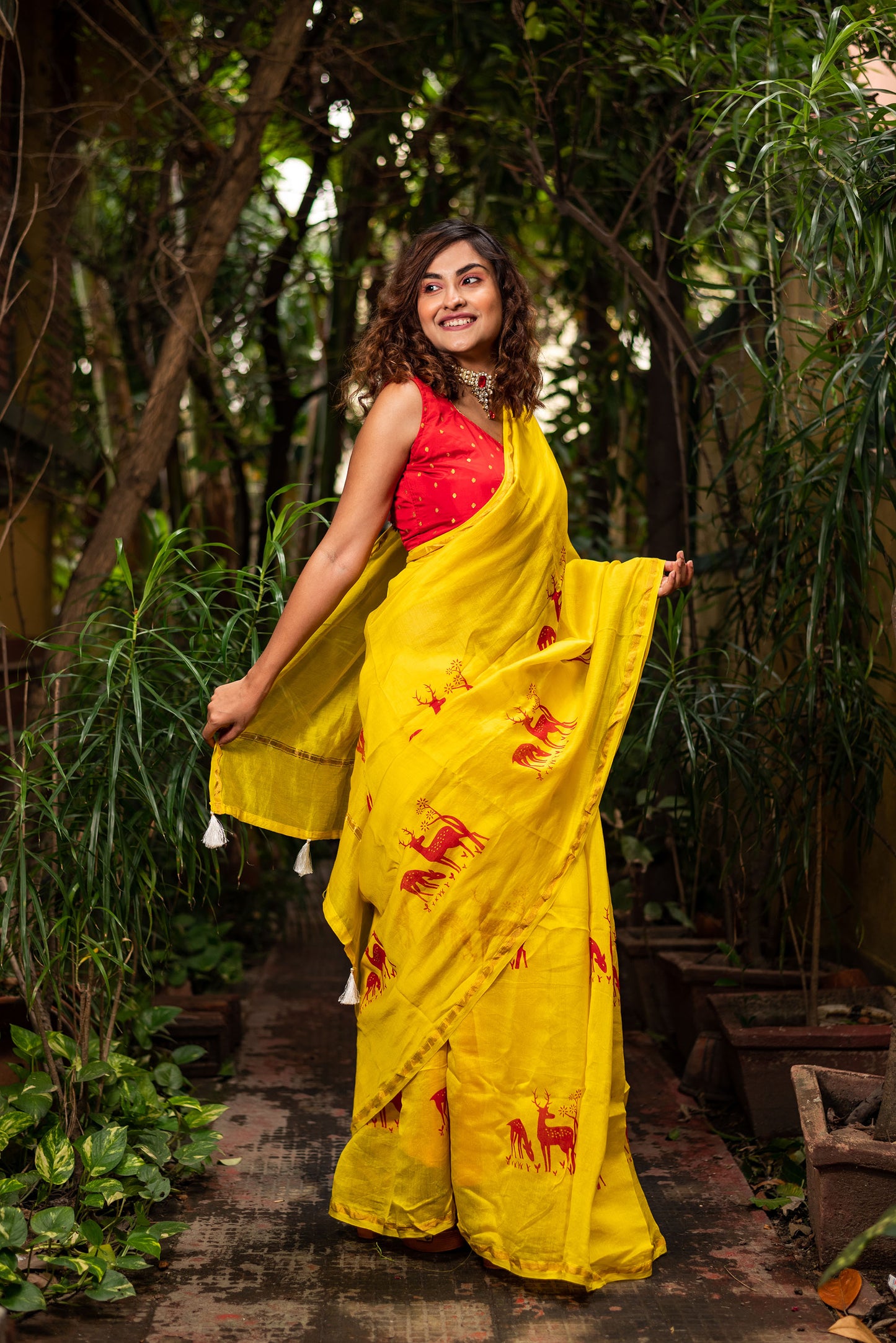 Yellow chanderi silk saree with ethnic deer motif