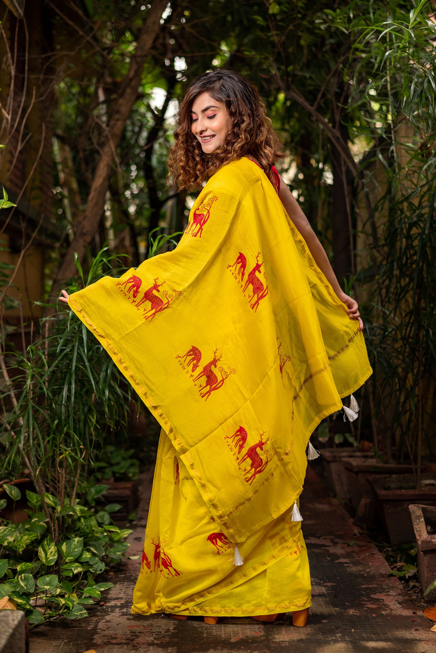 Yellow chanderi silk saree with ethnic deer motif