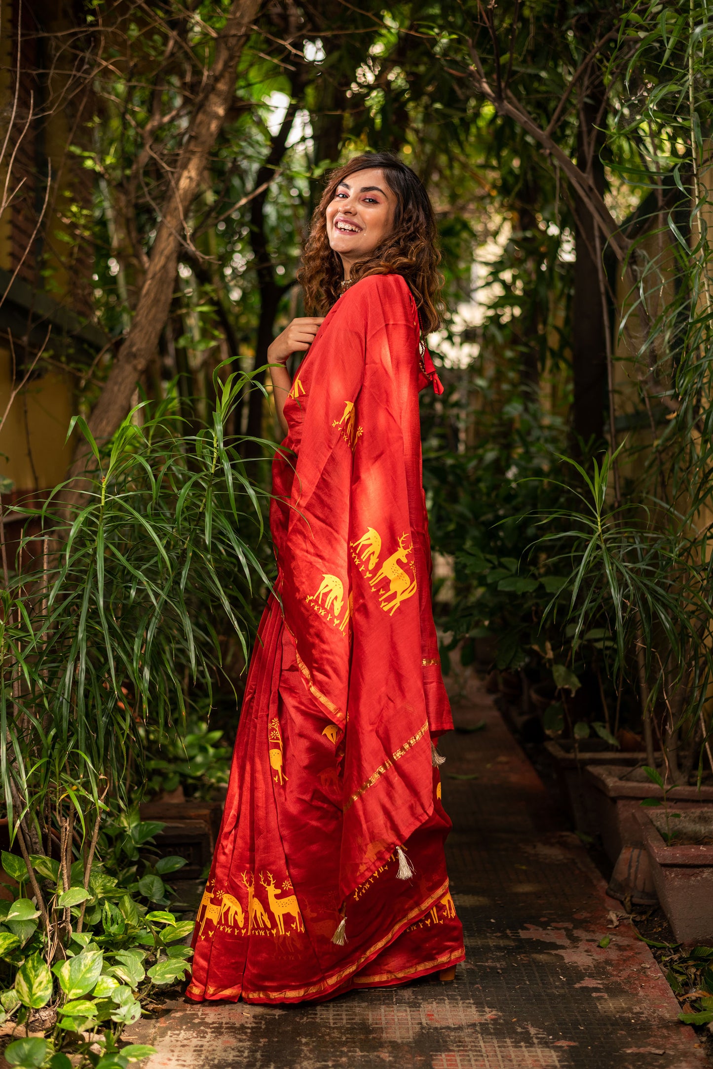 Red chanderi silk saree with ethnic deer motif