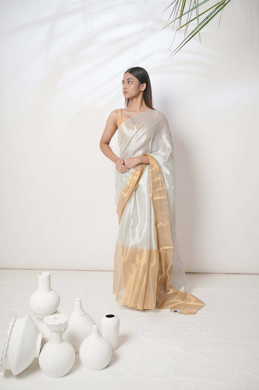 Aarna | Metallic white and gold tissue saree