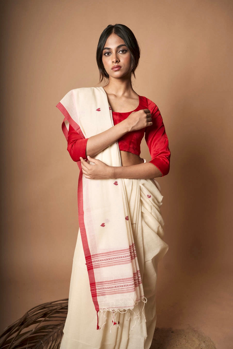 Alabaster I White cotton saree with red border and woven red heart motifs