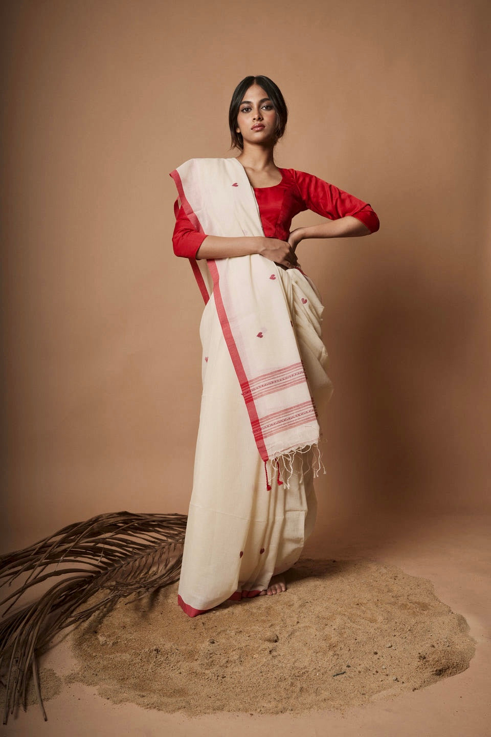 Alabaster I White cotton saree with red border and woven red heart motifs