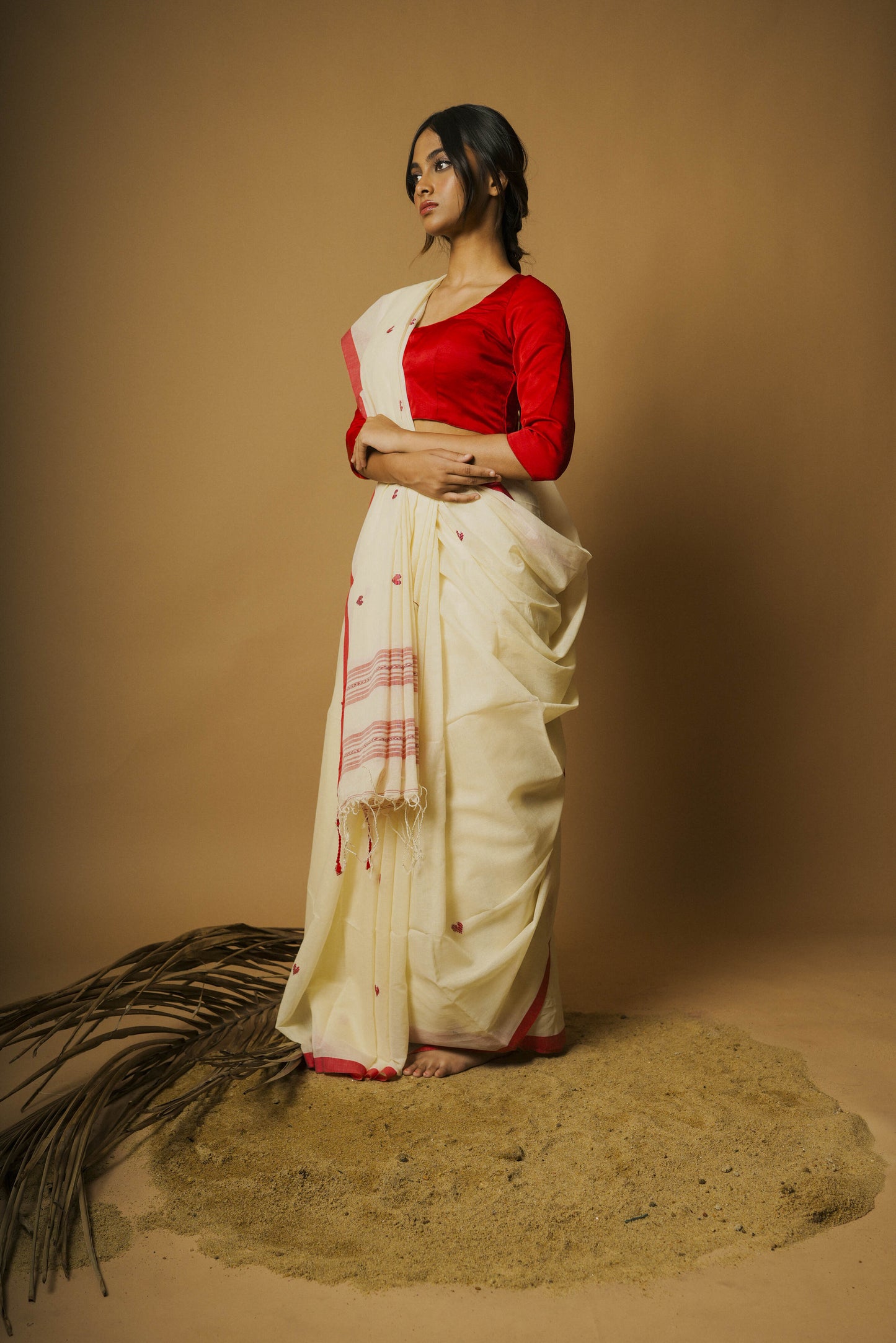 Alabaster I White cotton saree with red border and woven red heart motifs