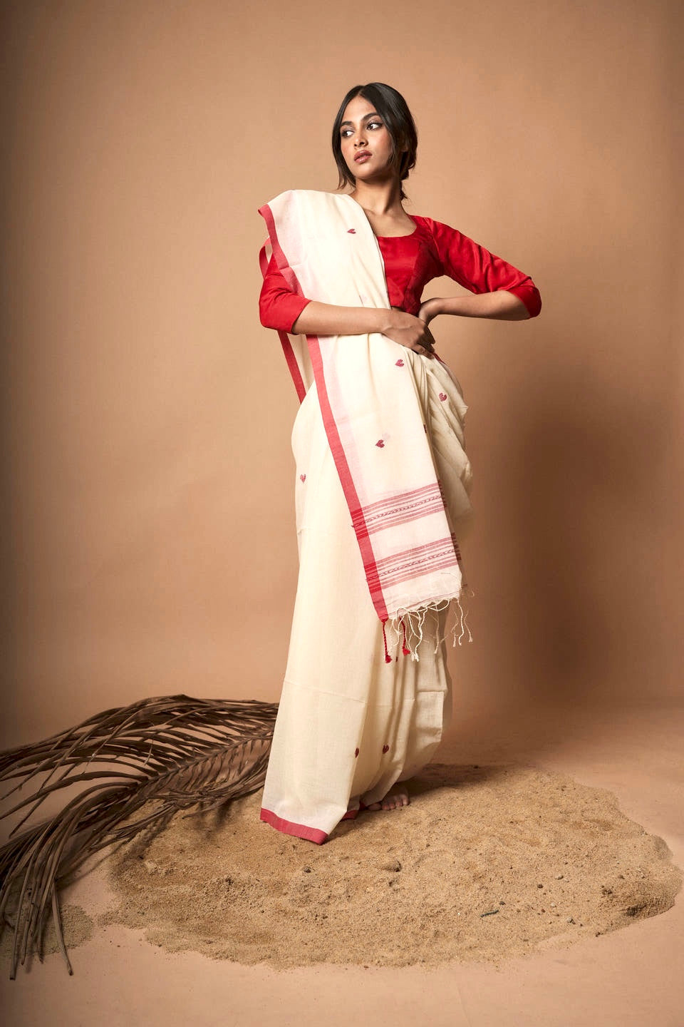 Alabaster I White cotton saree with red border and woven red heart motifs