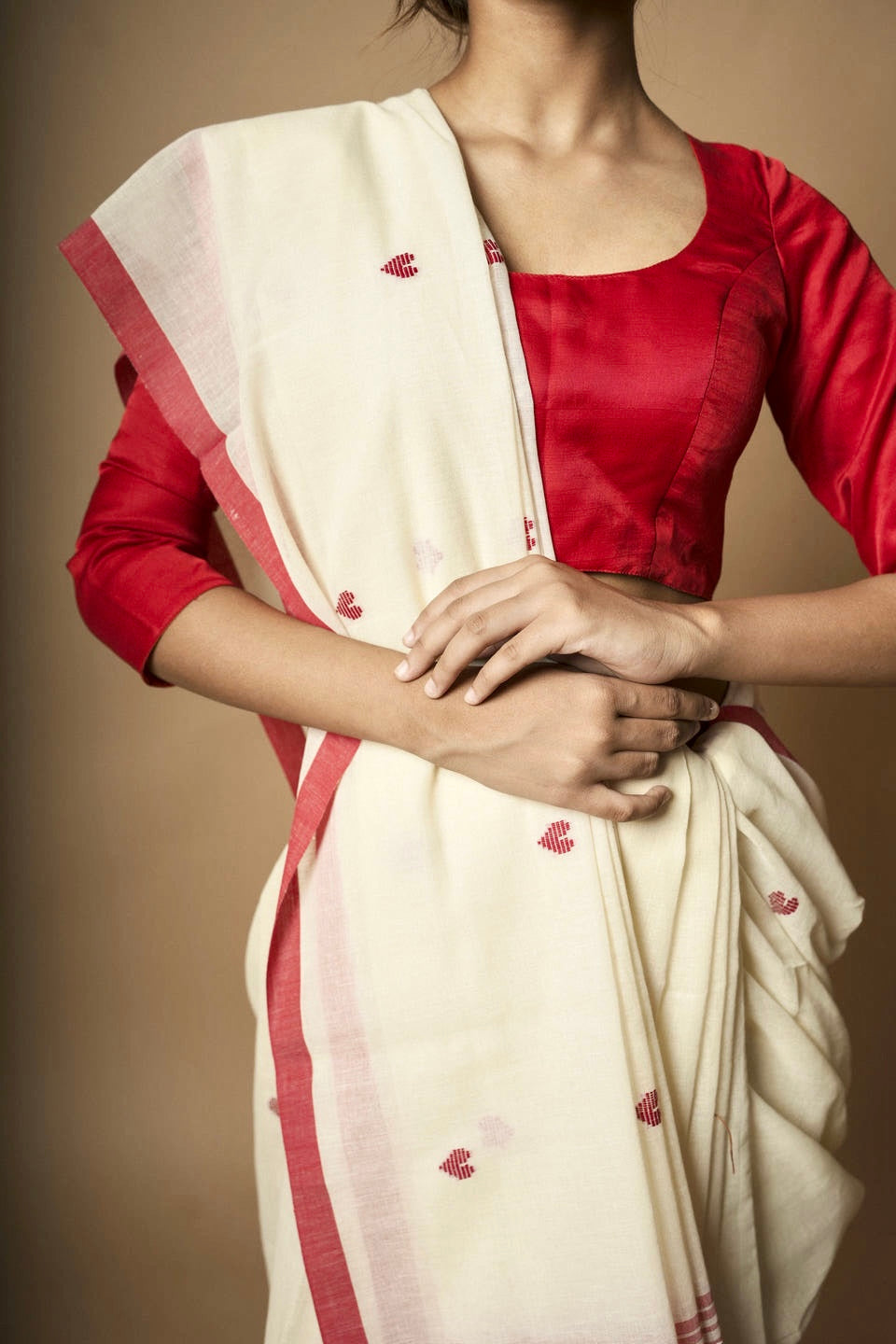 Alabaster I White cotton saree with red border and woven red heart motifs