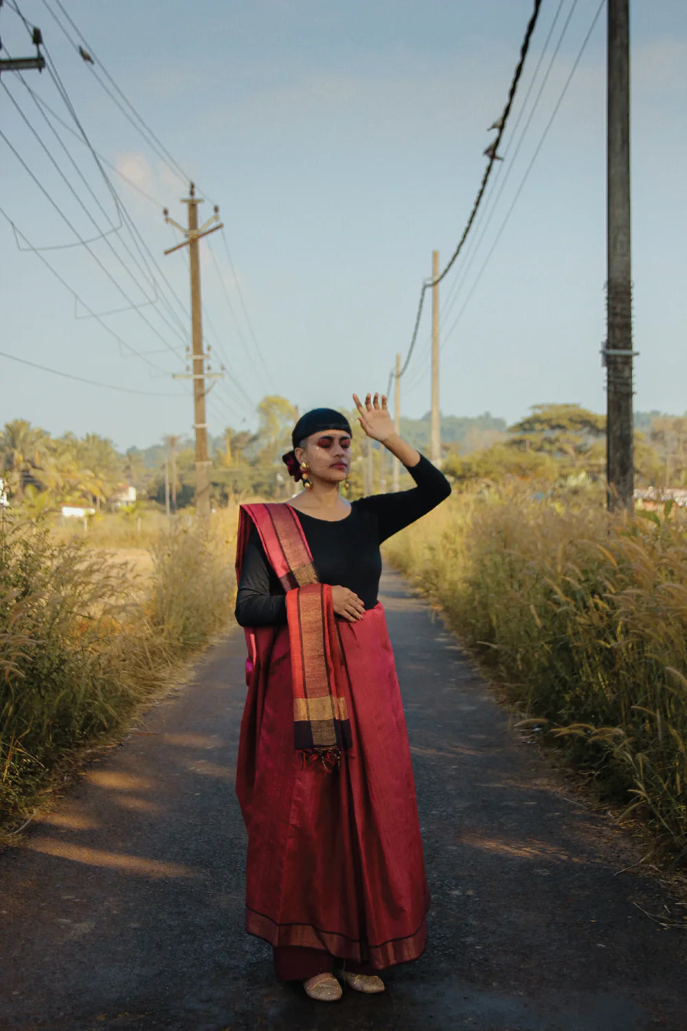 Maroon pure Tussar silk handloom saree with woven geometrical motifs and gold Zari border