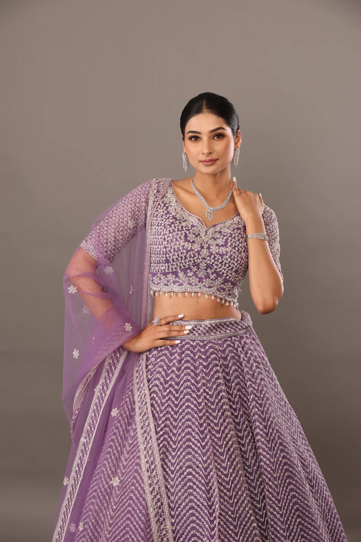 Lilac net base lehenga with embellishments bhas