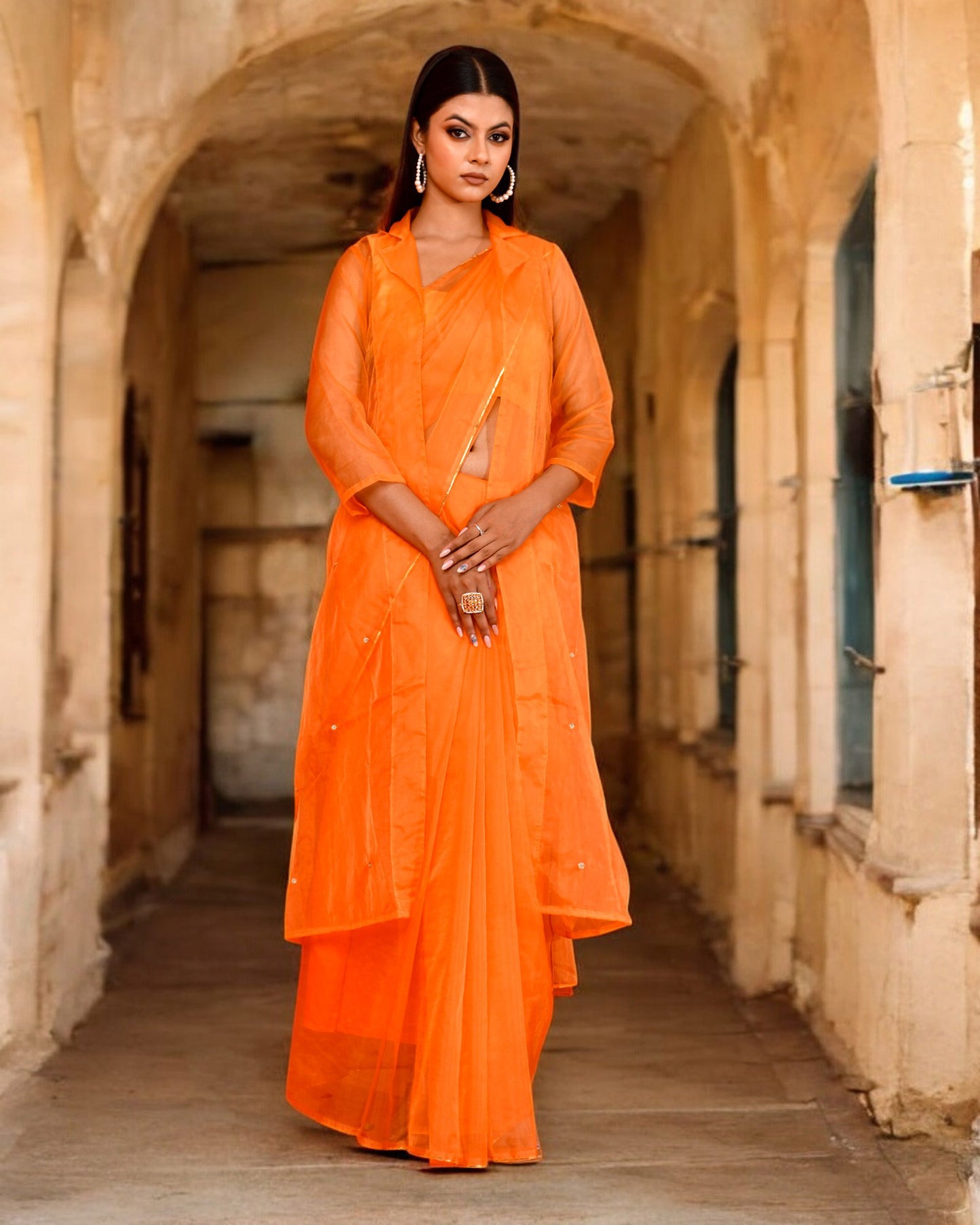 Pastel Orange Organza Embroidered Saree