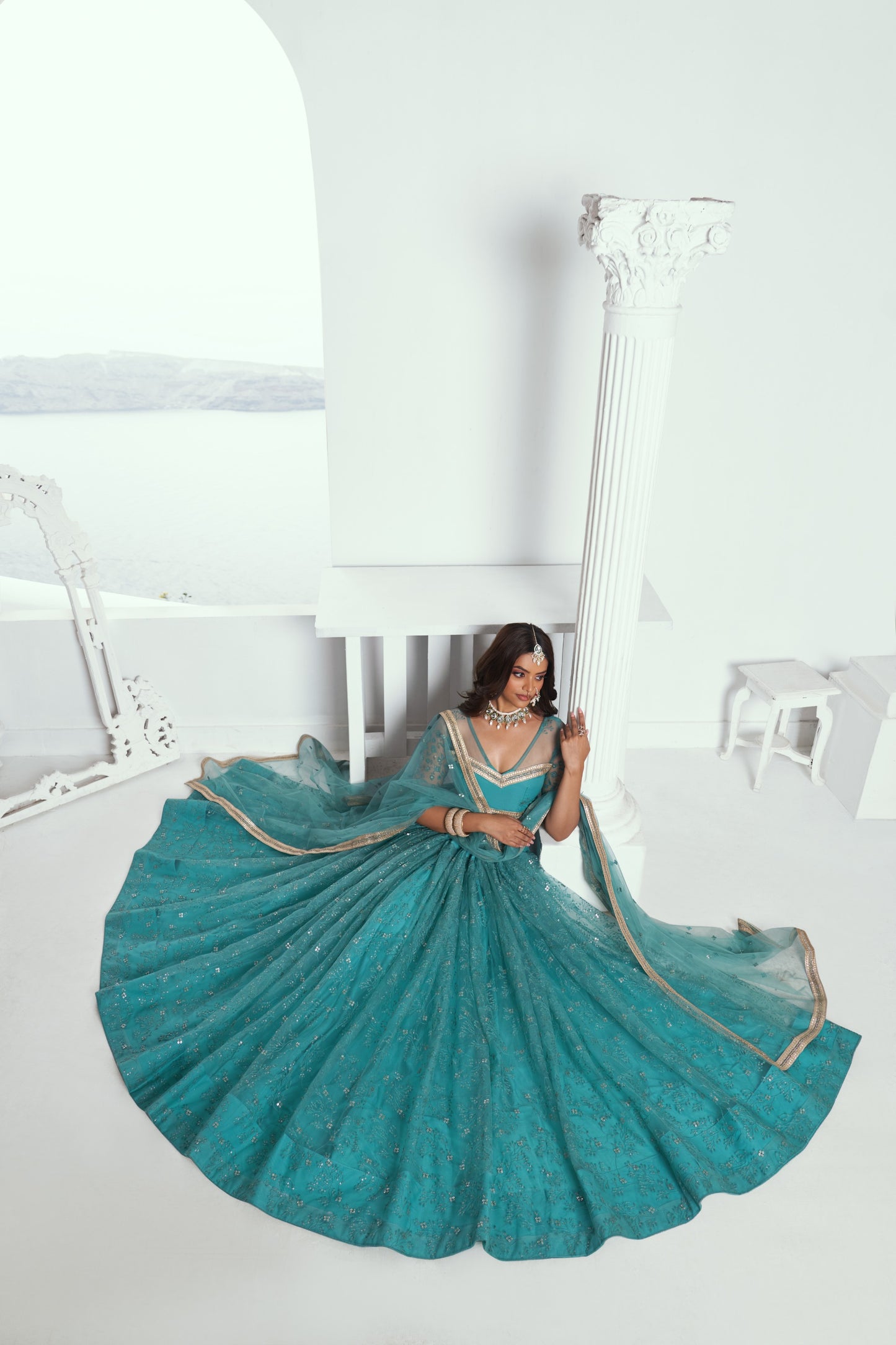 Sea Green Sequins Embroidery Net Bridesmaid Lehenga