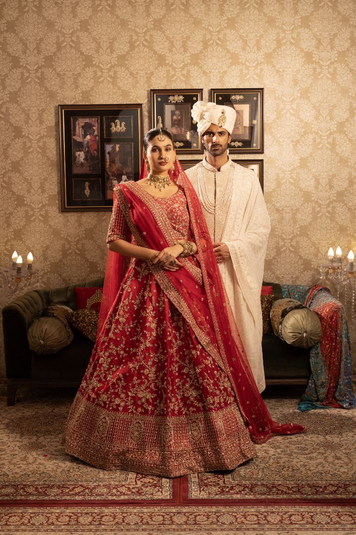 Red Silk Bridal Lehenga with floral motifs, sequins & cutdana embellishment