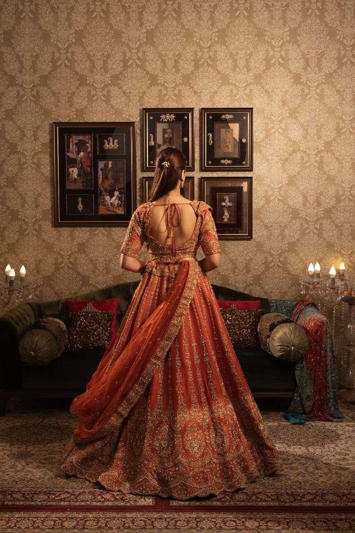 Rust Bridal Lehenga with Cutdana & Sequins Gold Embellishment and Double Dupatta