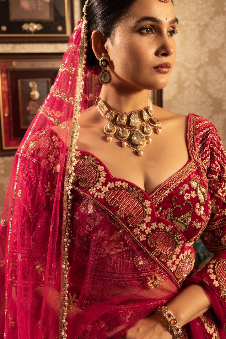 Maroon velvet Bridal Lehenga with heavy embroidery