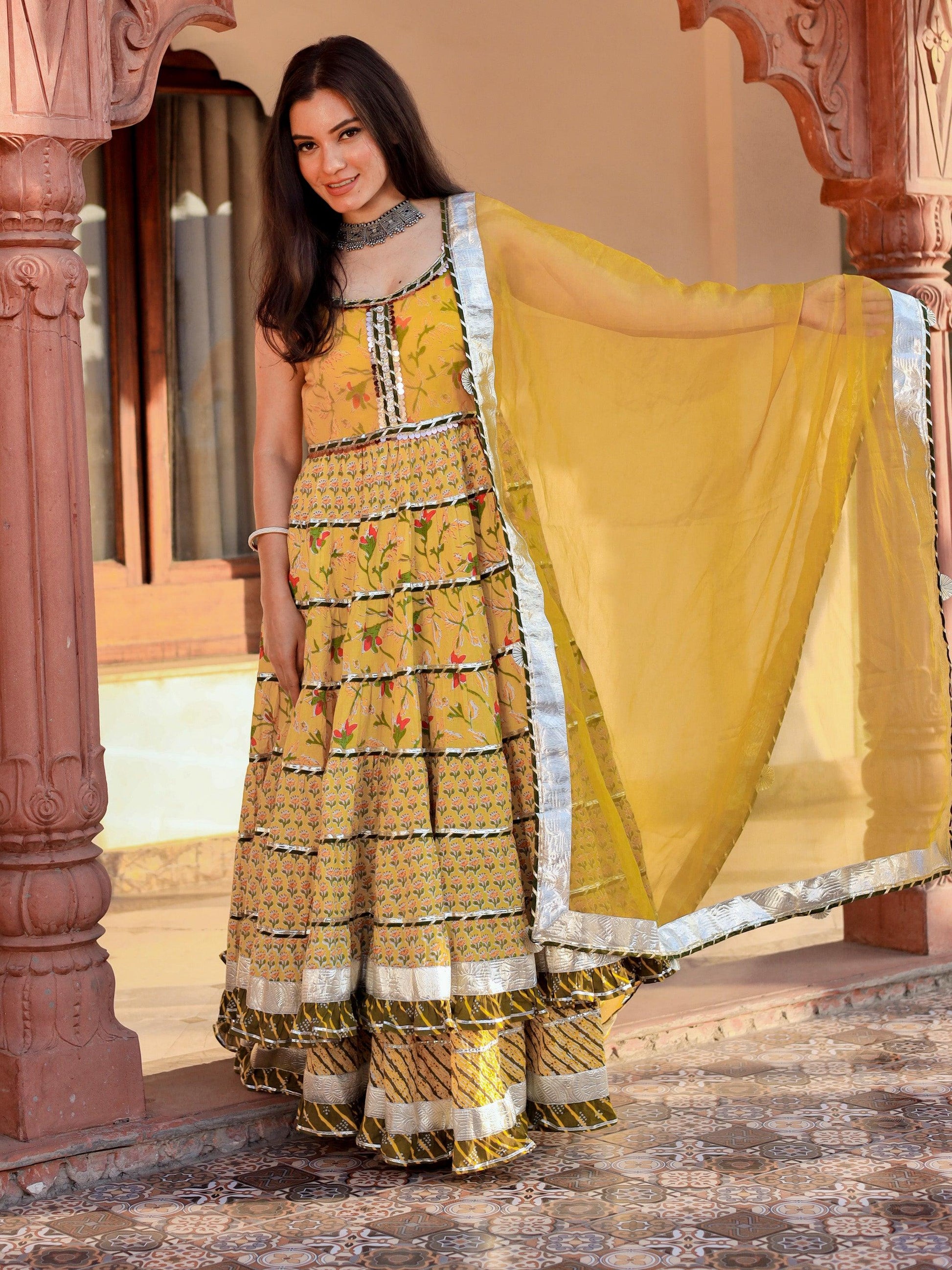 Divena Yellow Cotton Sleeves less anarkali Skirt Set With Dupatta - divenaworld.com