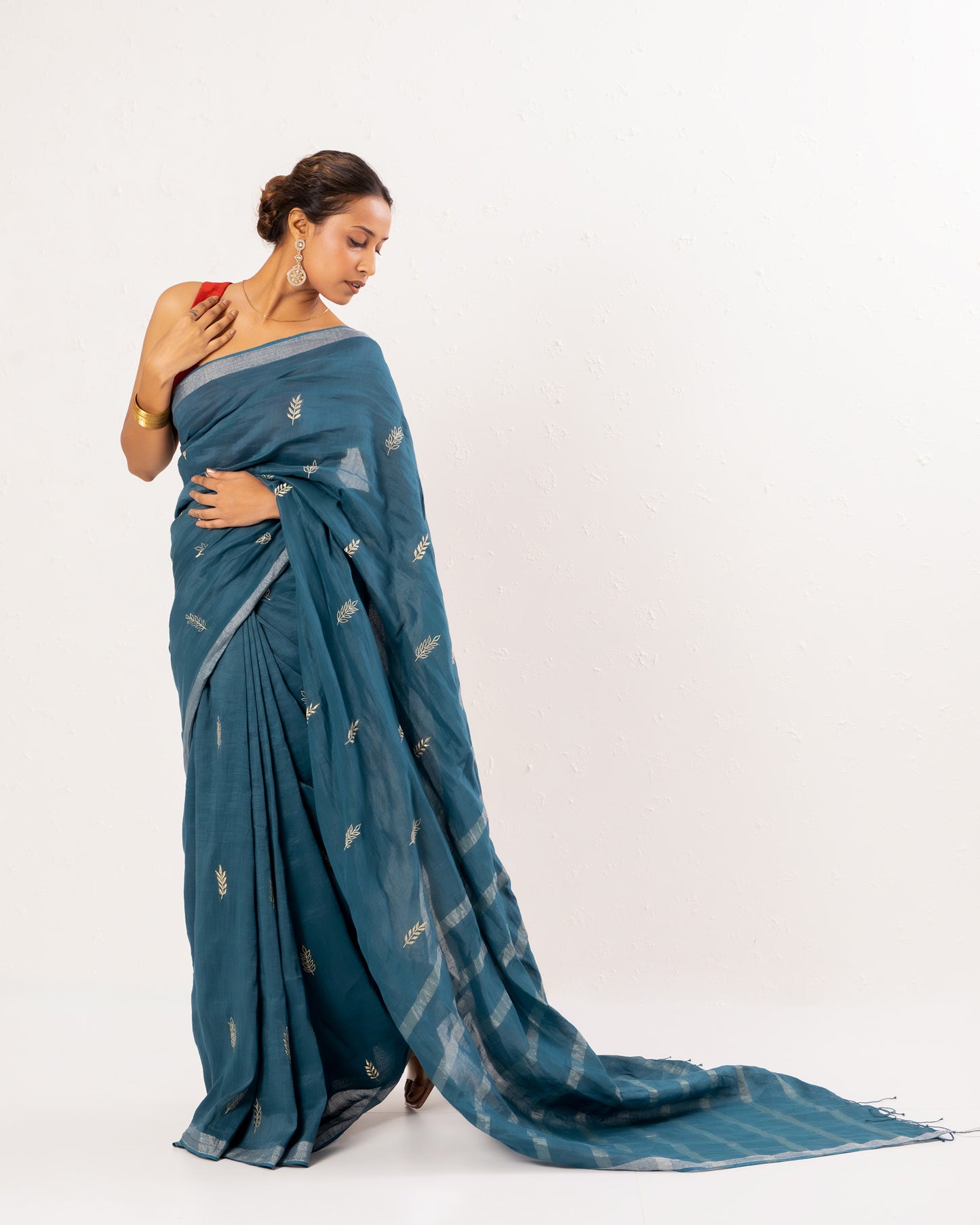 Blue embroidered handwoven linen saree