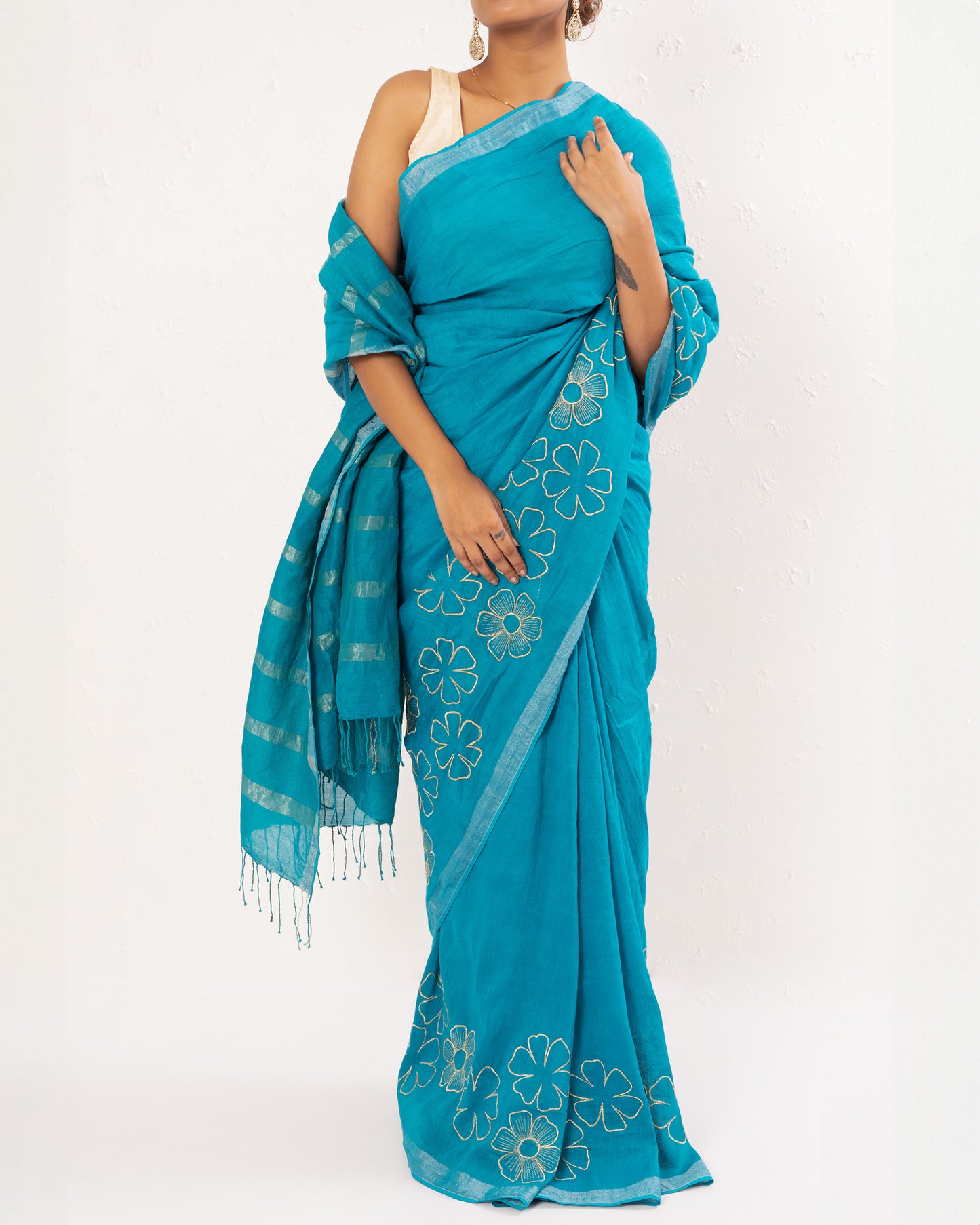 Cyan Blue embroidered handwoven linen saree