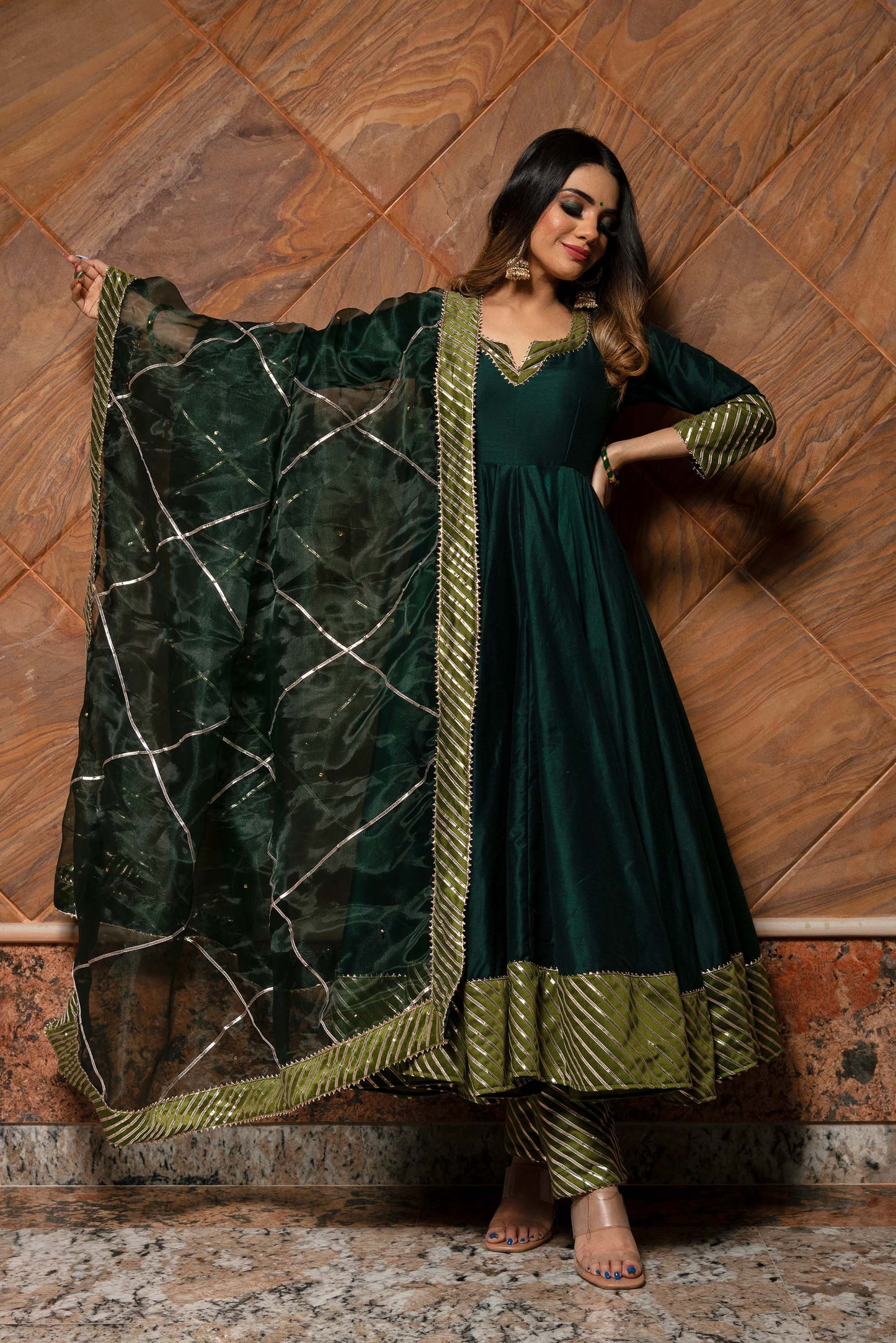 Ganguar Jannat dark green anarkali set