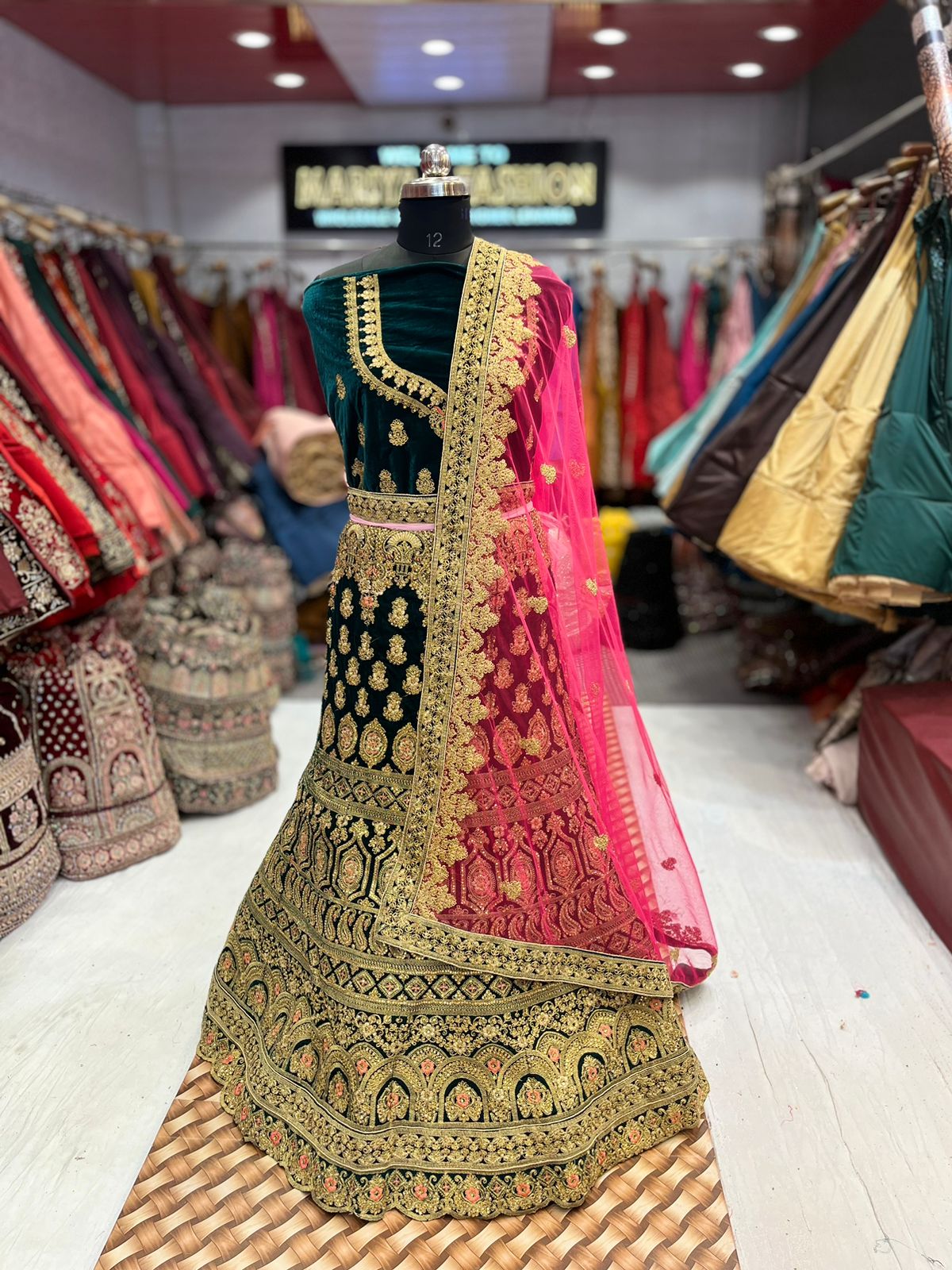 Dark green and Pink Micro Velvet lehenga ( Bazaar )