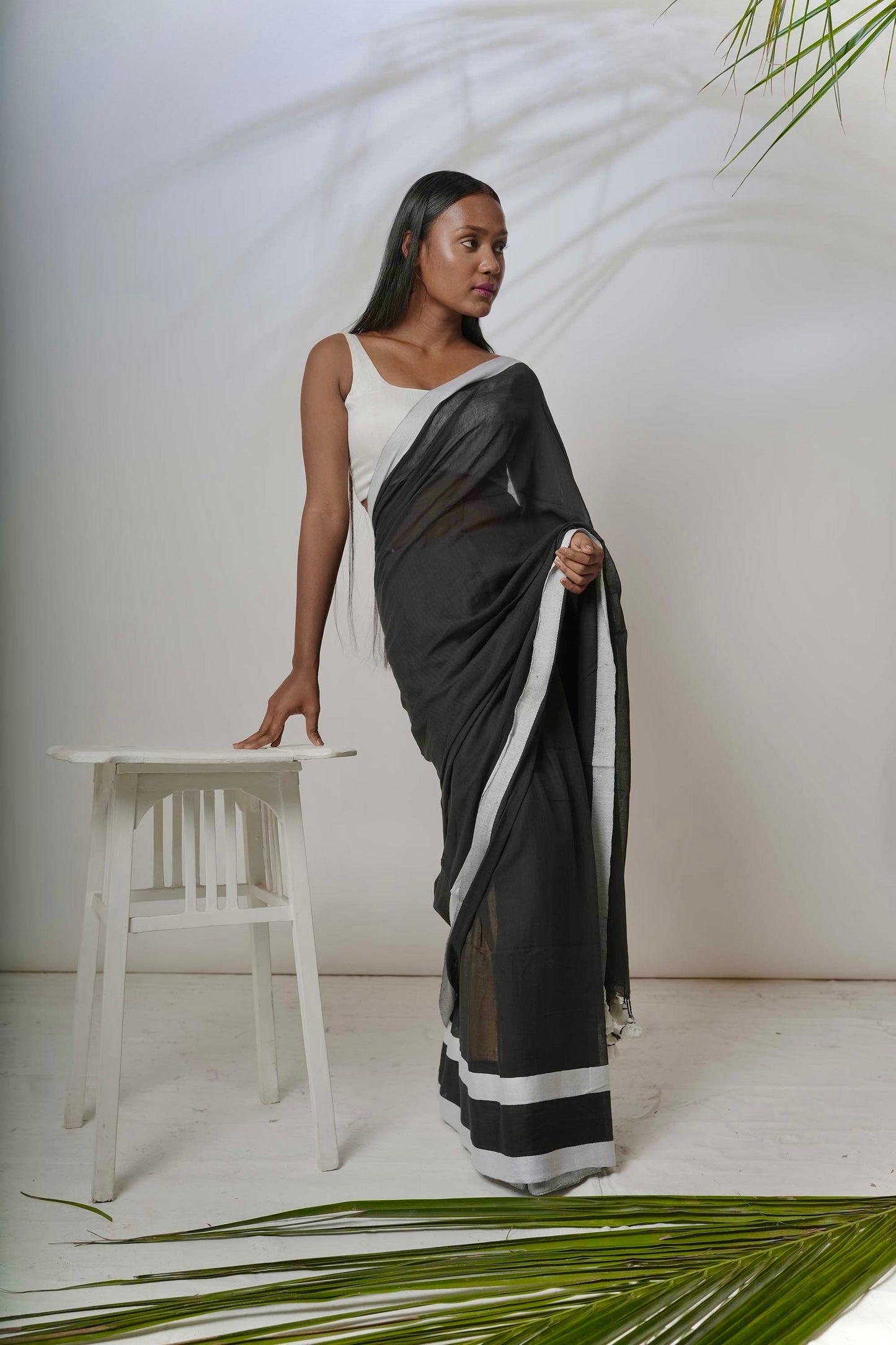 Enigma I Black cotton handloom saree with white coloured twill jacquard border