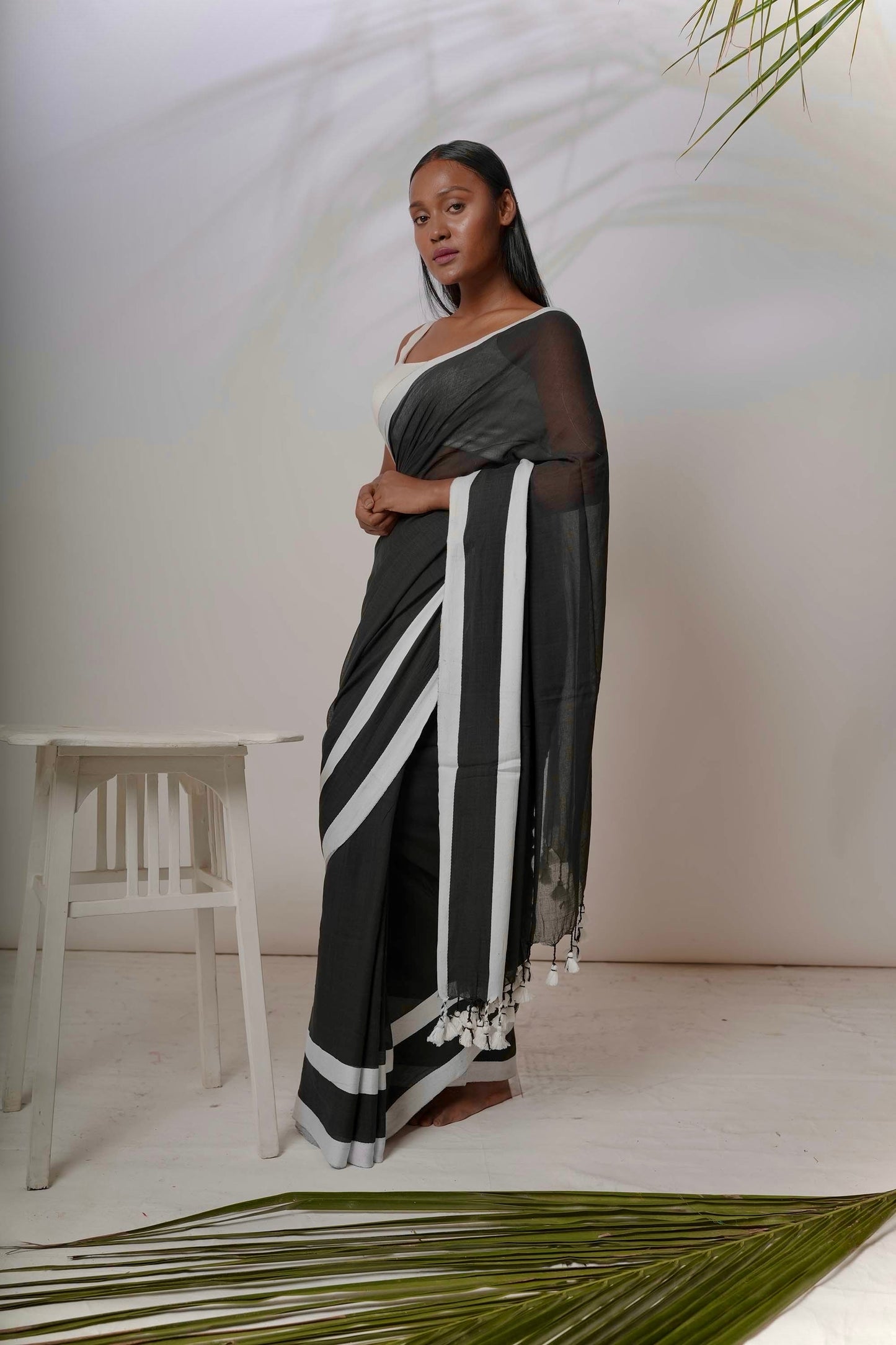 Enigma I Black cotton handloom saree with white coloured twill jacquard border